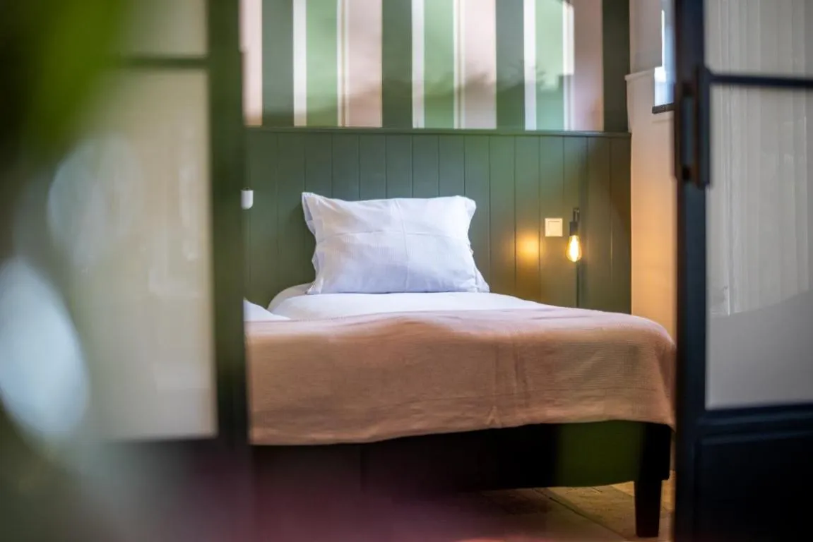 Bed in Hotel Herberg de Lindehoeve