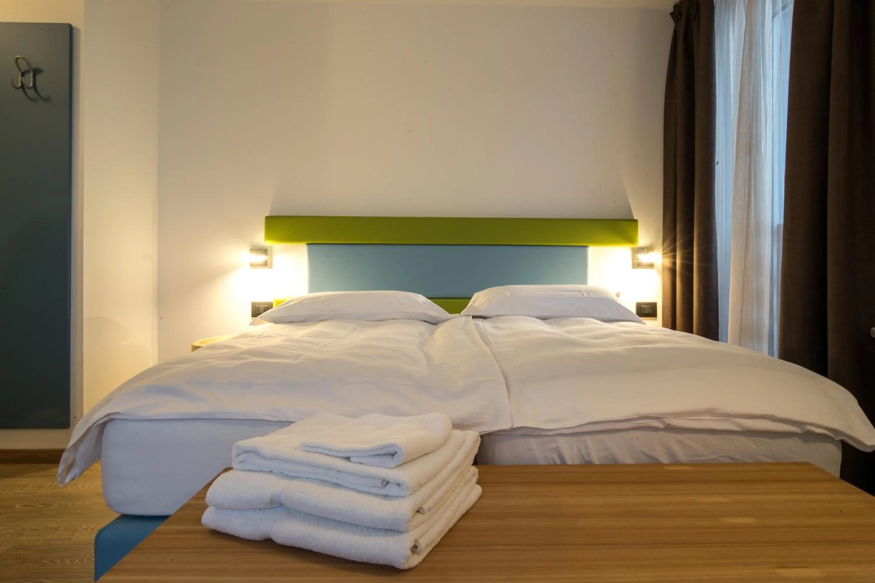 Bed in Alpencolor Hotel Tonale