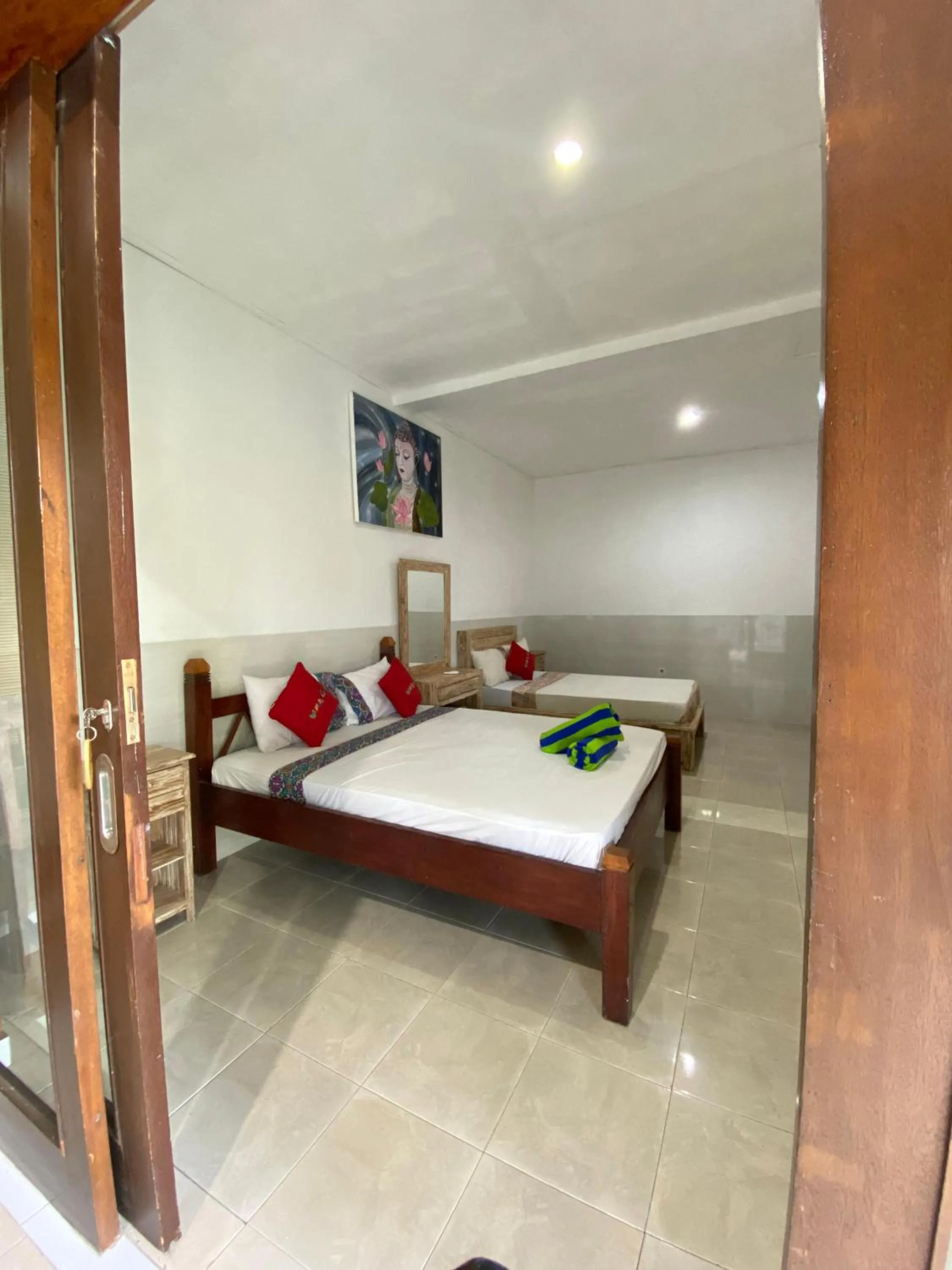 Bed in COCONUT BEACH BUNGALOWs & WARUNG 2