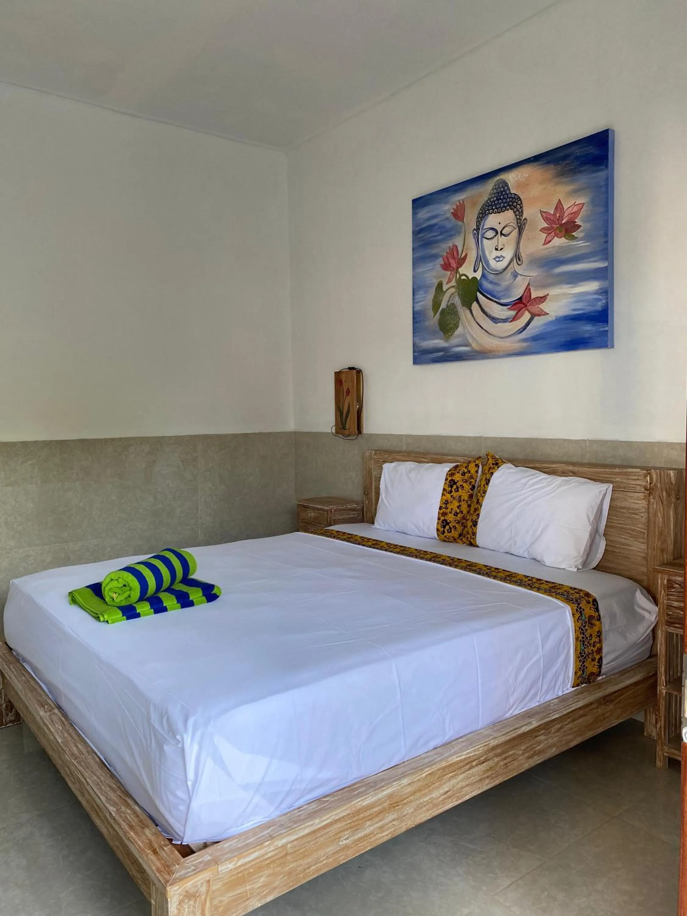 Bed in COCONUT BEACH BUNGALOWs & WARUNG 2