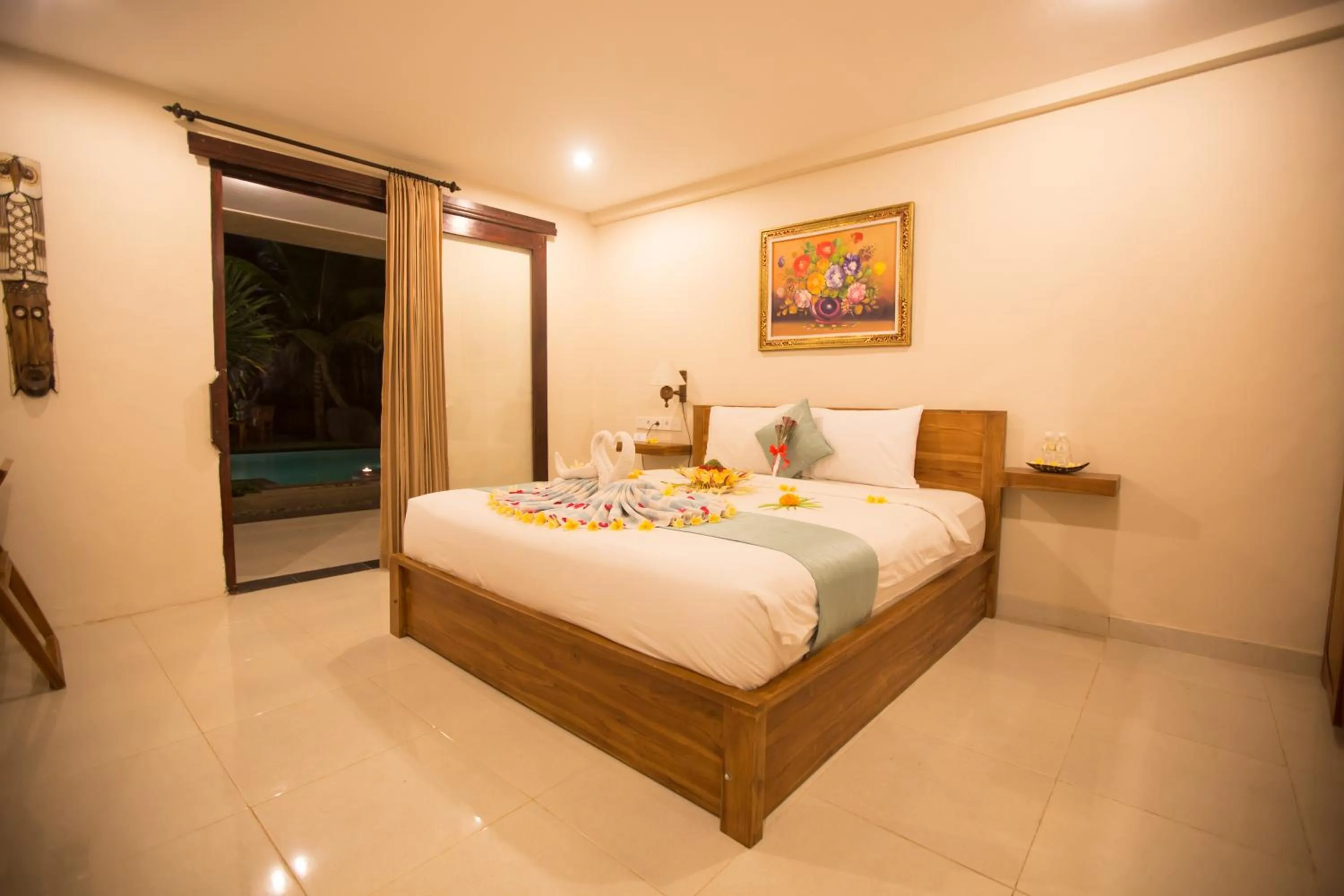 Bed in Asri Sari Ubud Villa & Resort