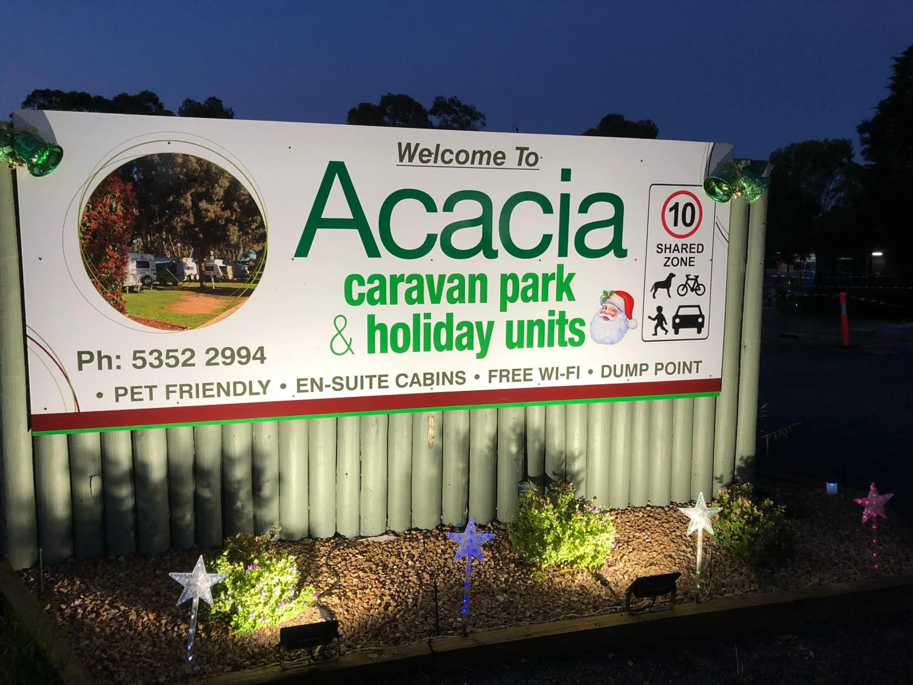 Property logo or sign in Acacia Caravan Park & Holiday Units