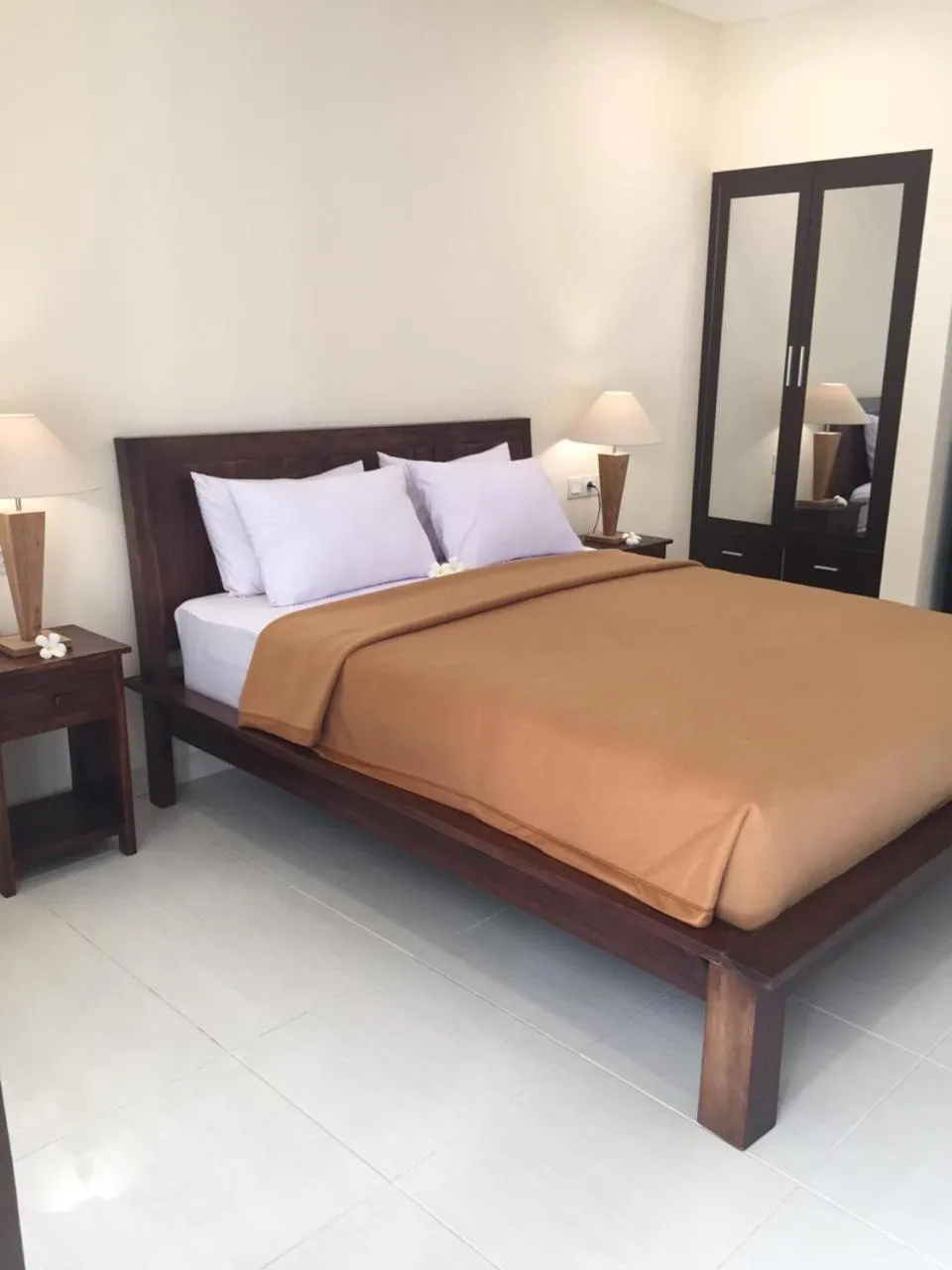 Bed in Eddys Cottages & Villa