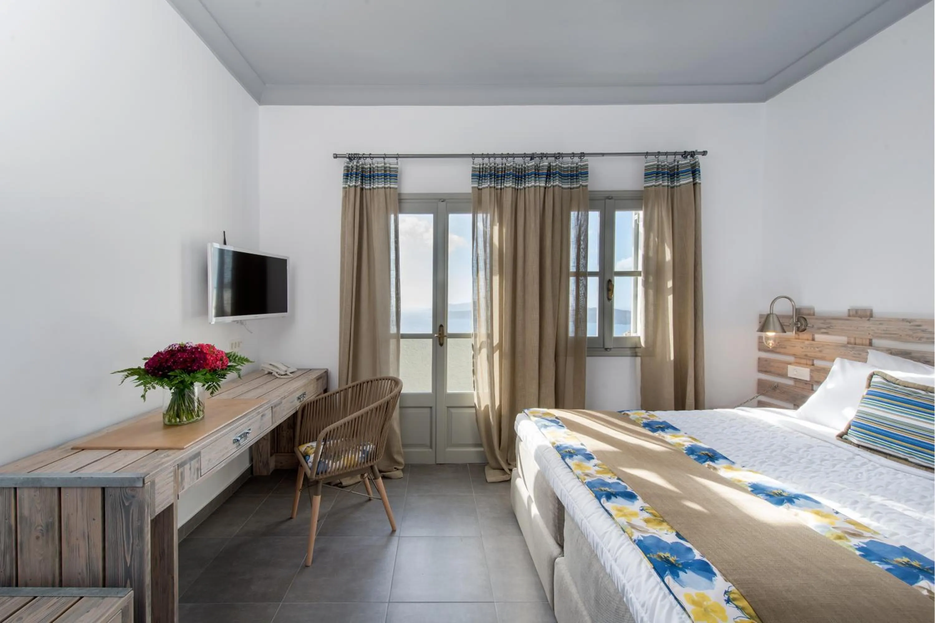 Bed in Caldera's Dolphin Suites