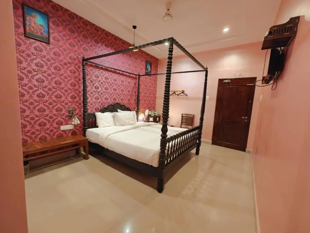 Bed in Chola Heritage Resort