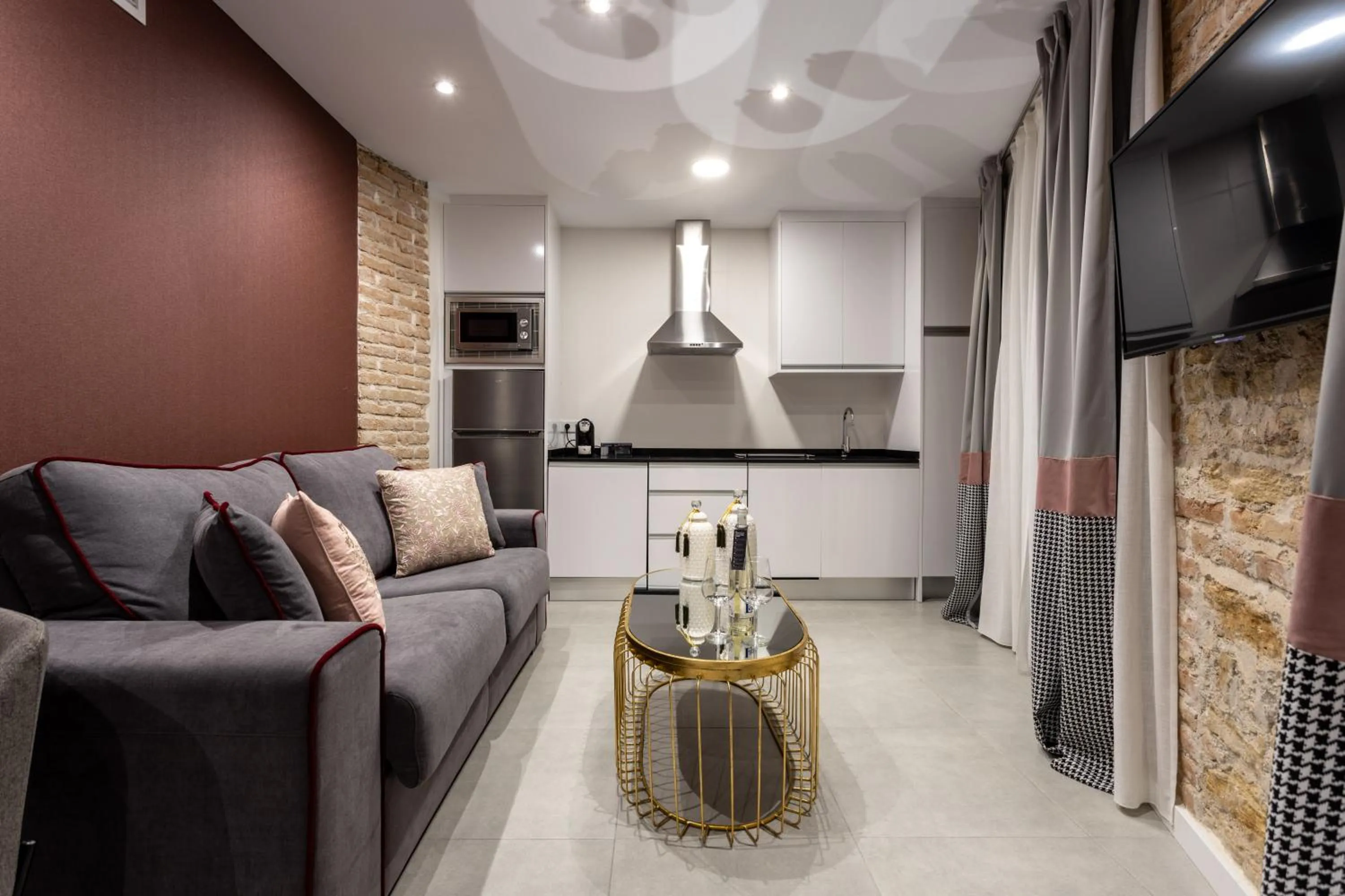 Kitchen or kitchenette in BiBo Suites Plaza Nueva