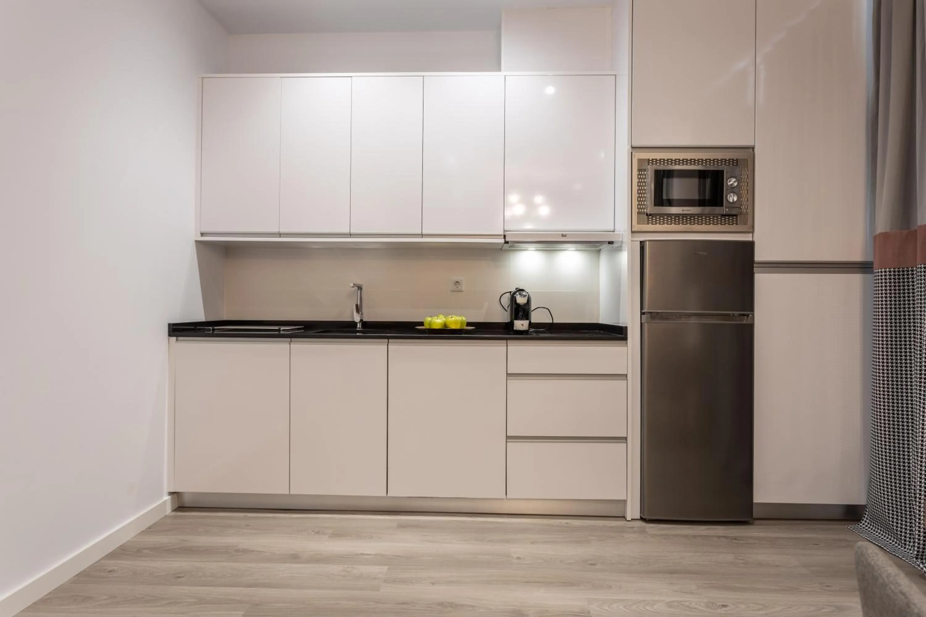 Kitchen or kitchenette in BiBo Suites Plaza Nueva