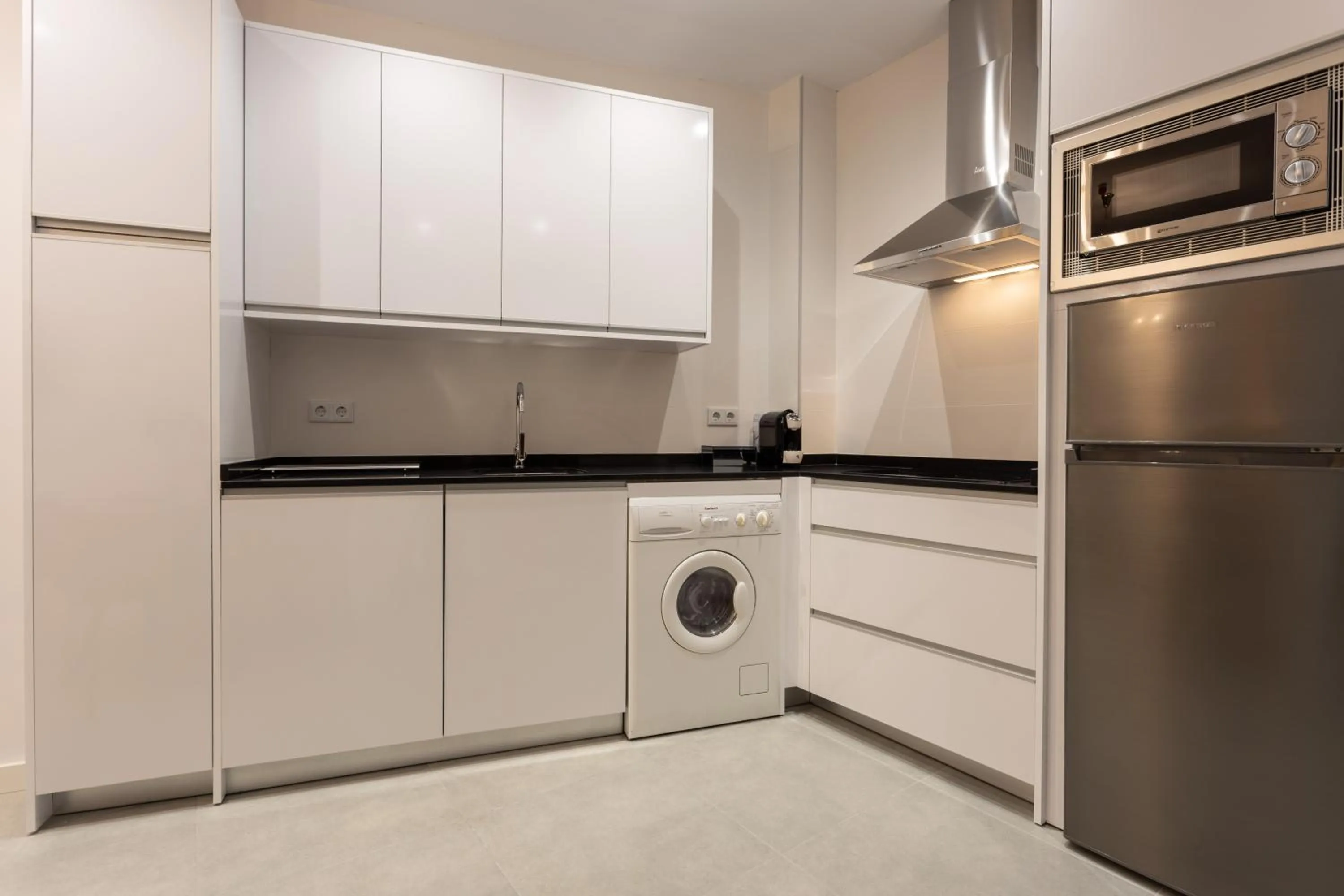 Kitchen or kitchenette in BiBo Suites Plaza Nueva