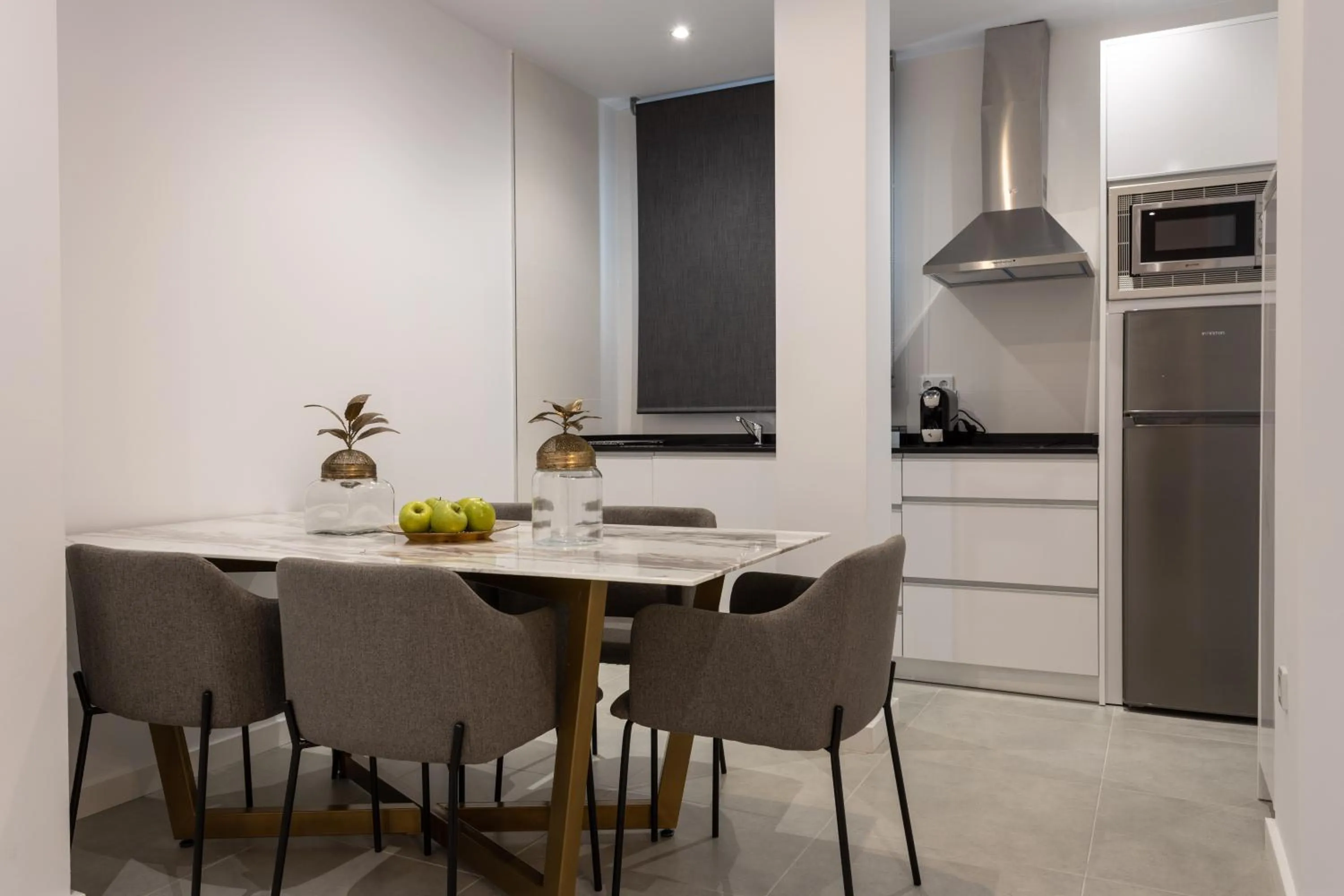 Kitchen or kitchenette in BiBo Suites Plaza Nueva