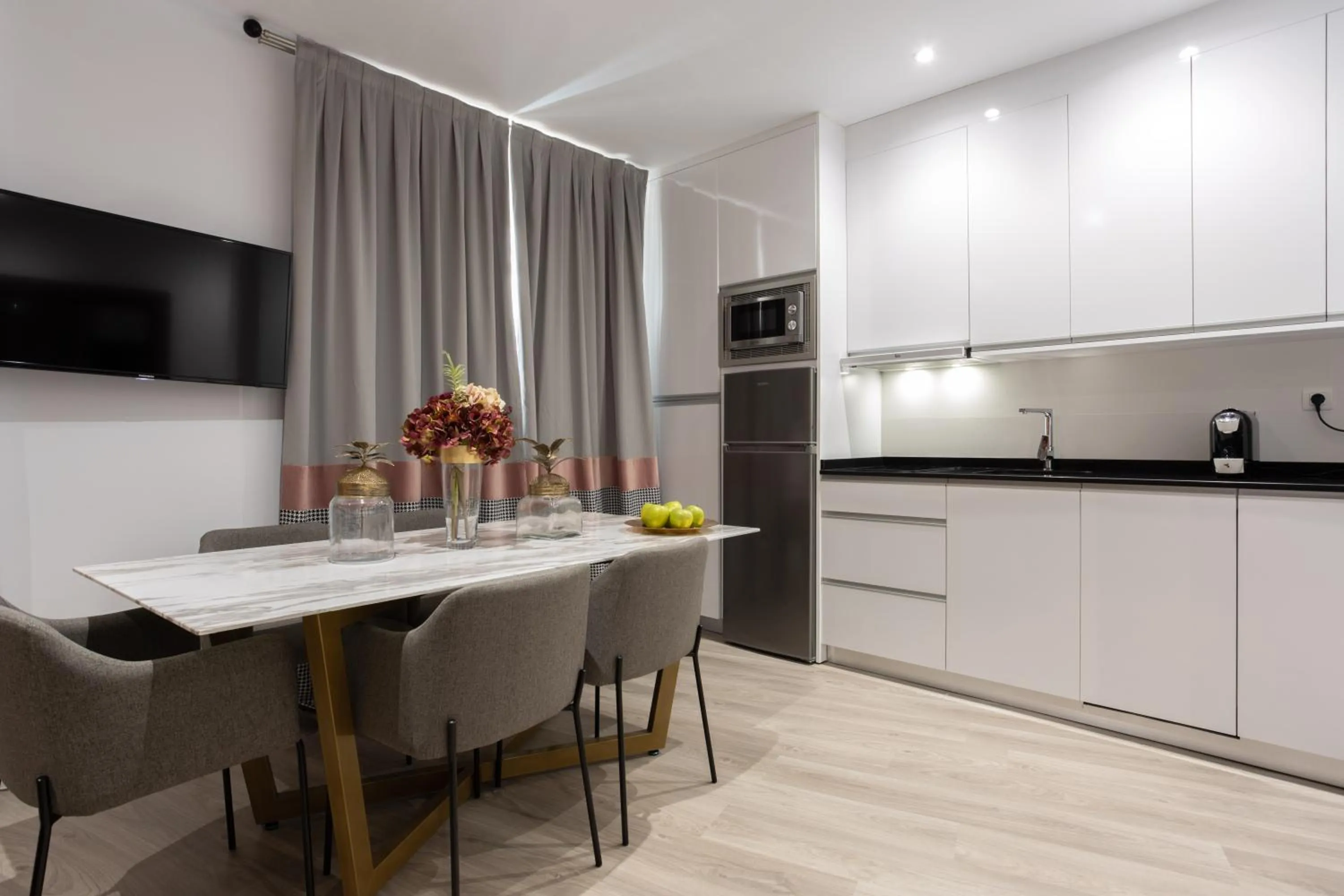 Kitchen or kitchenette in BiBo Suites Plaza Nueva