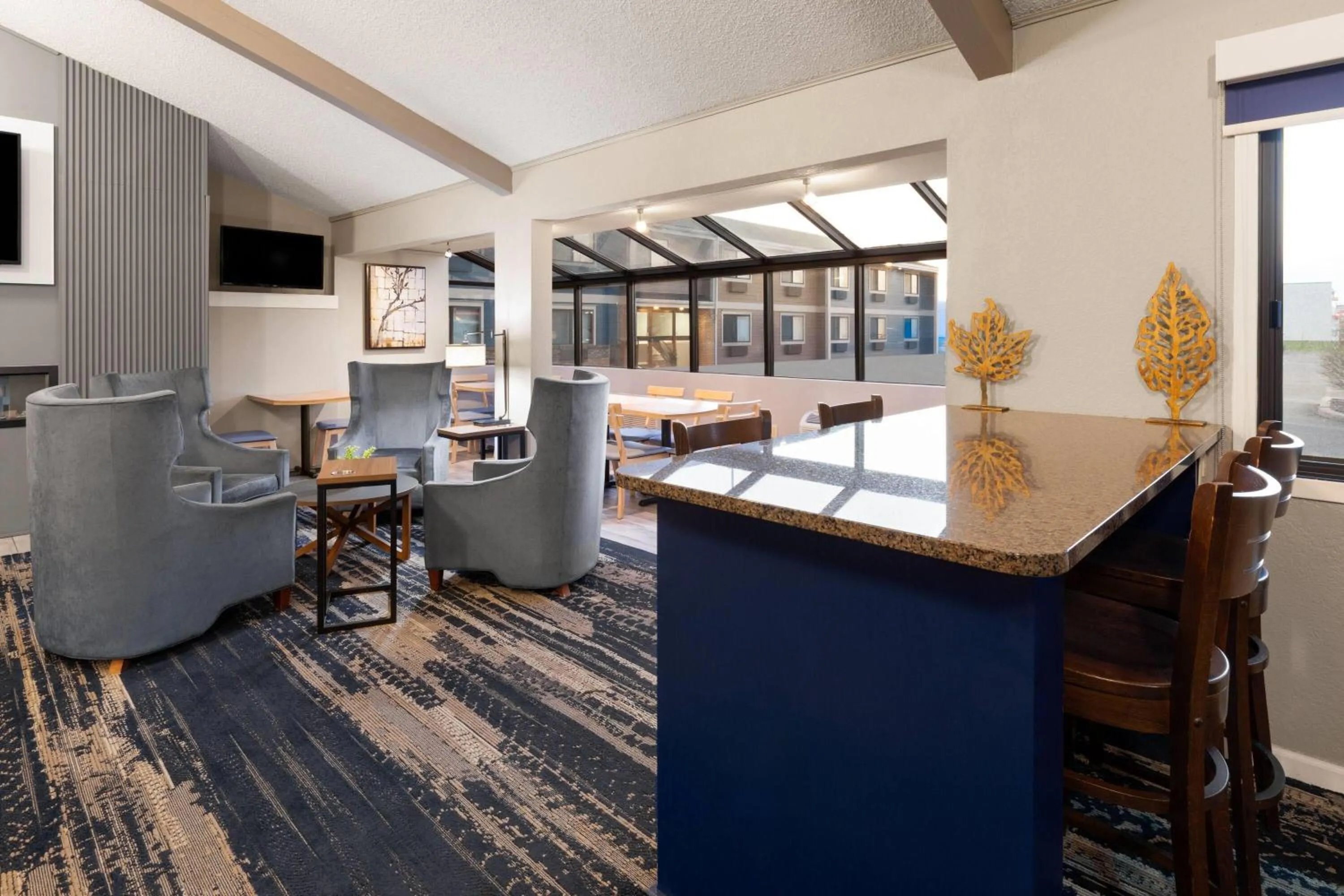 Lobby or reception in AmericInn by Wyndham Chippewa Falls