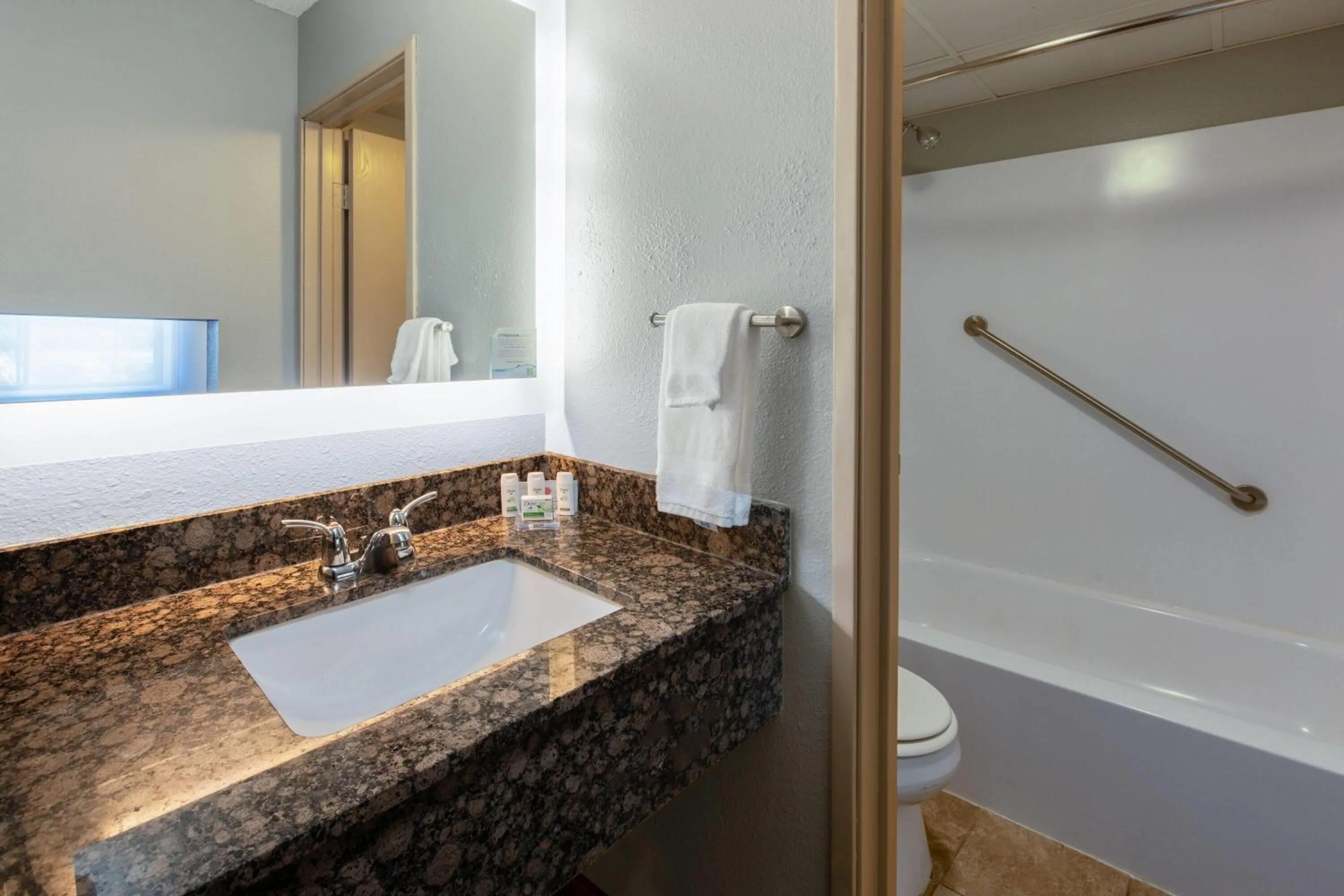 Bathroom in AmericInn by Wyndham Chippewa Falls