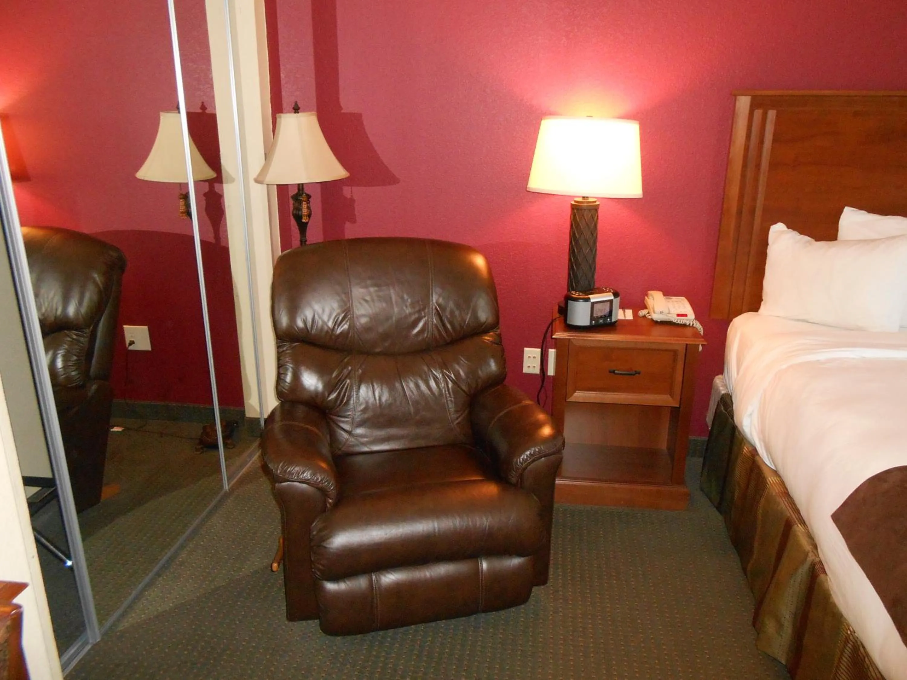 Bed in AmericInn by Wyndham McAlester