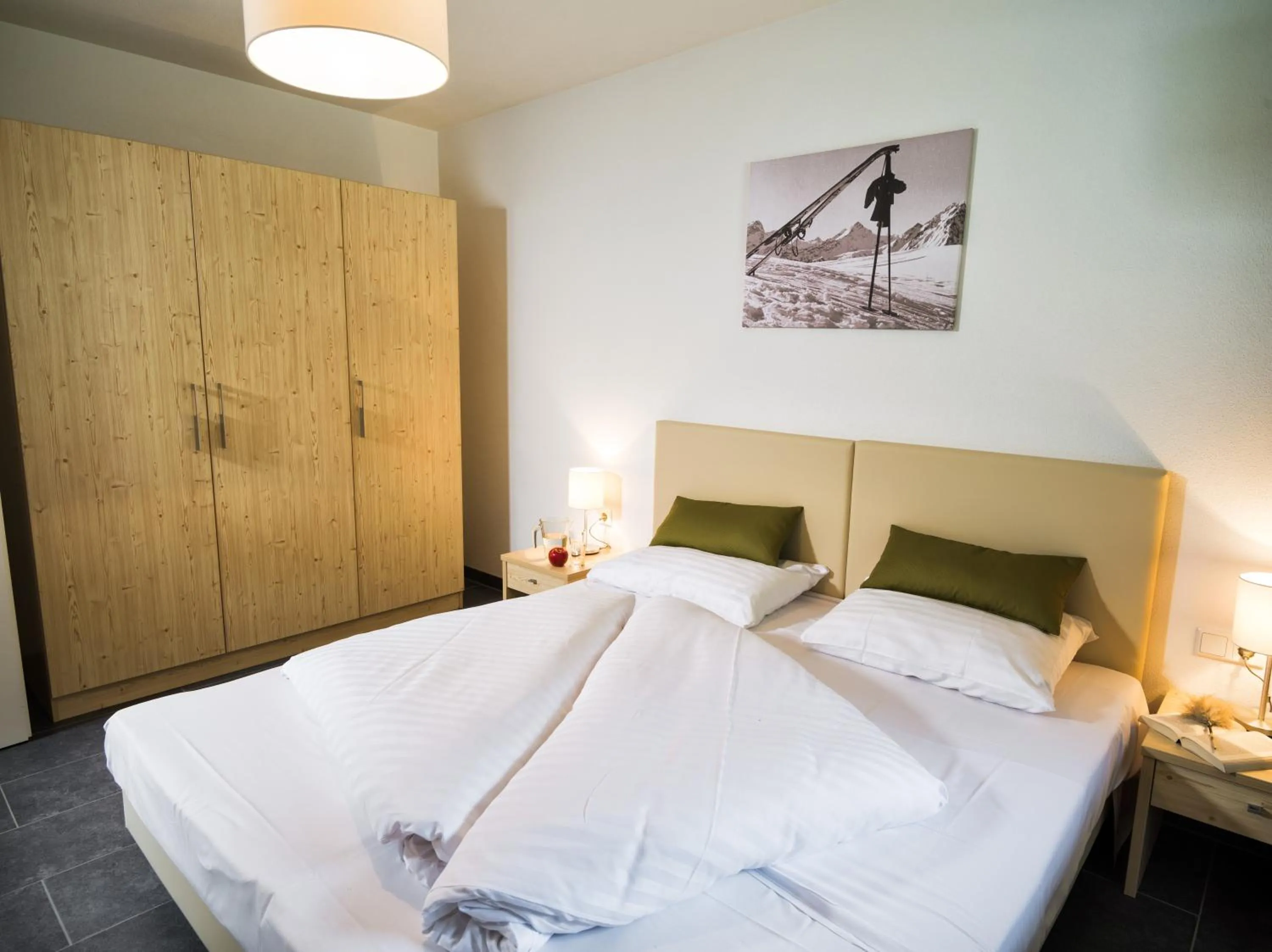 Bedroom, Bed in AlpenParks Chalet & Apartment AreitXpress
