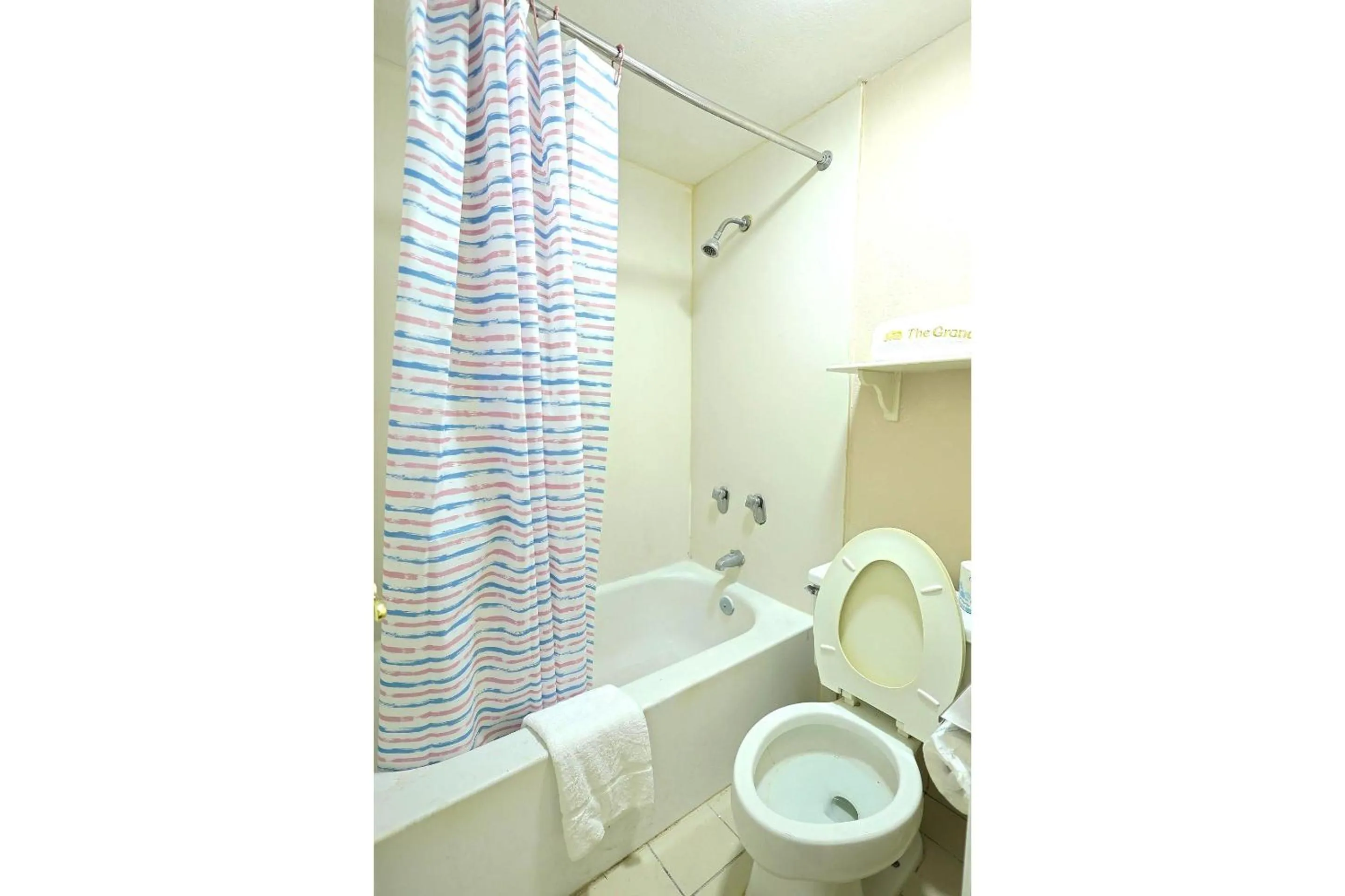 Bathroom in The Grand by Capital O Texarkana I-30