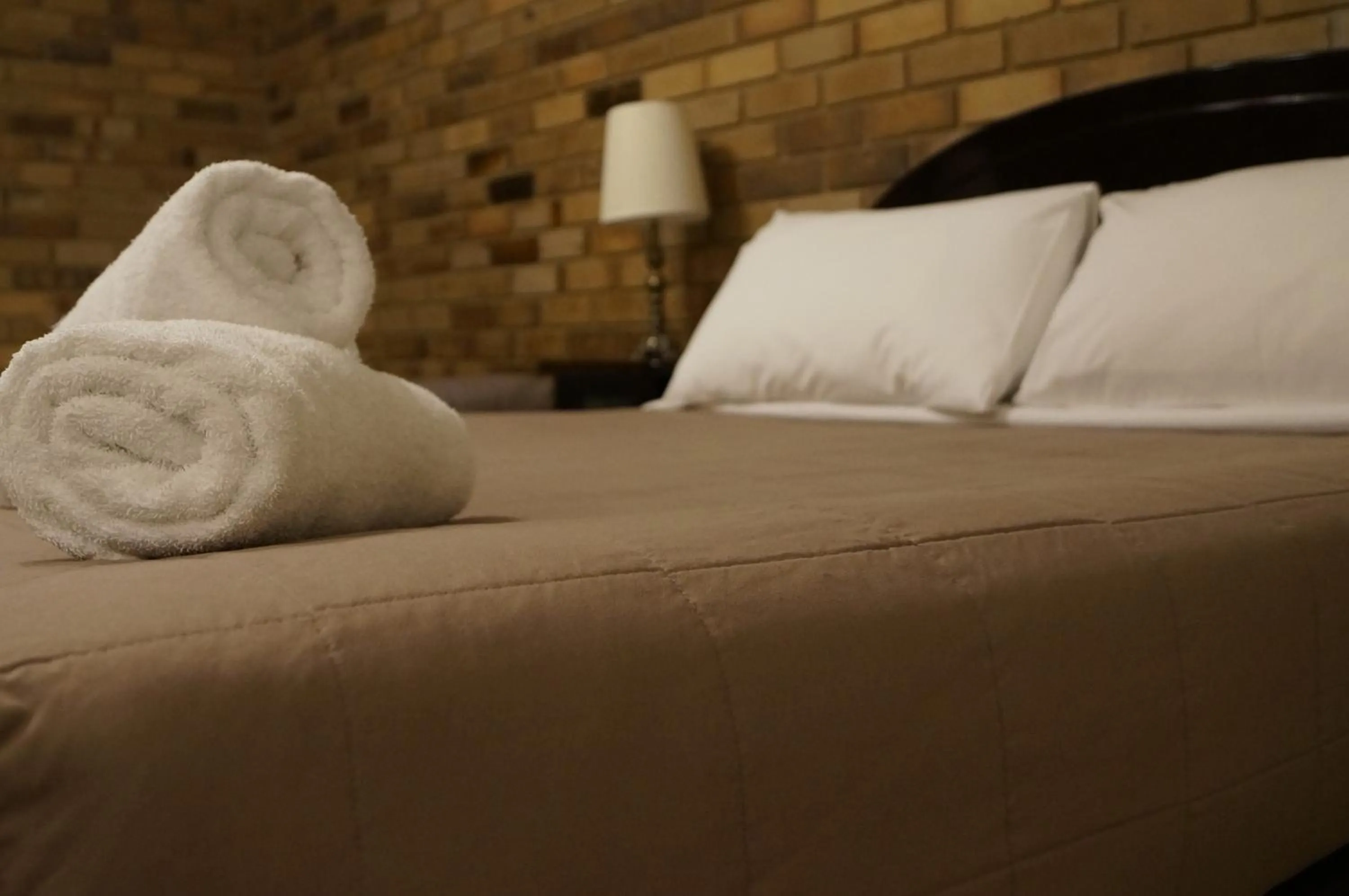 Bed in Magdala Motor Lodge & Lakeside Restaurant