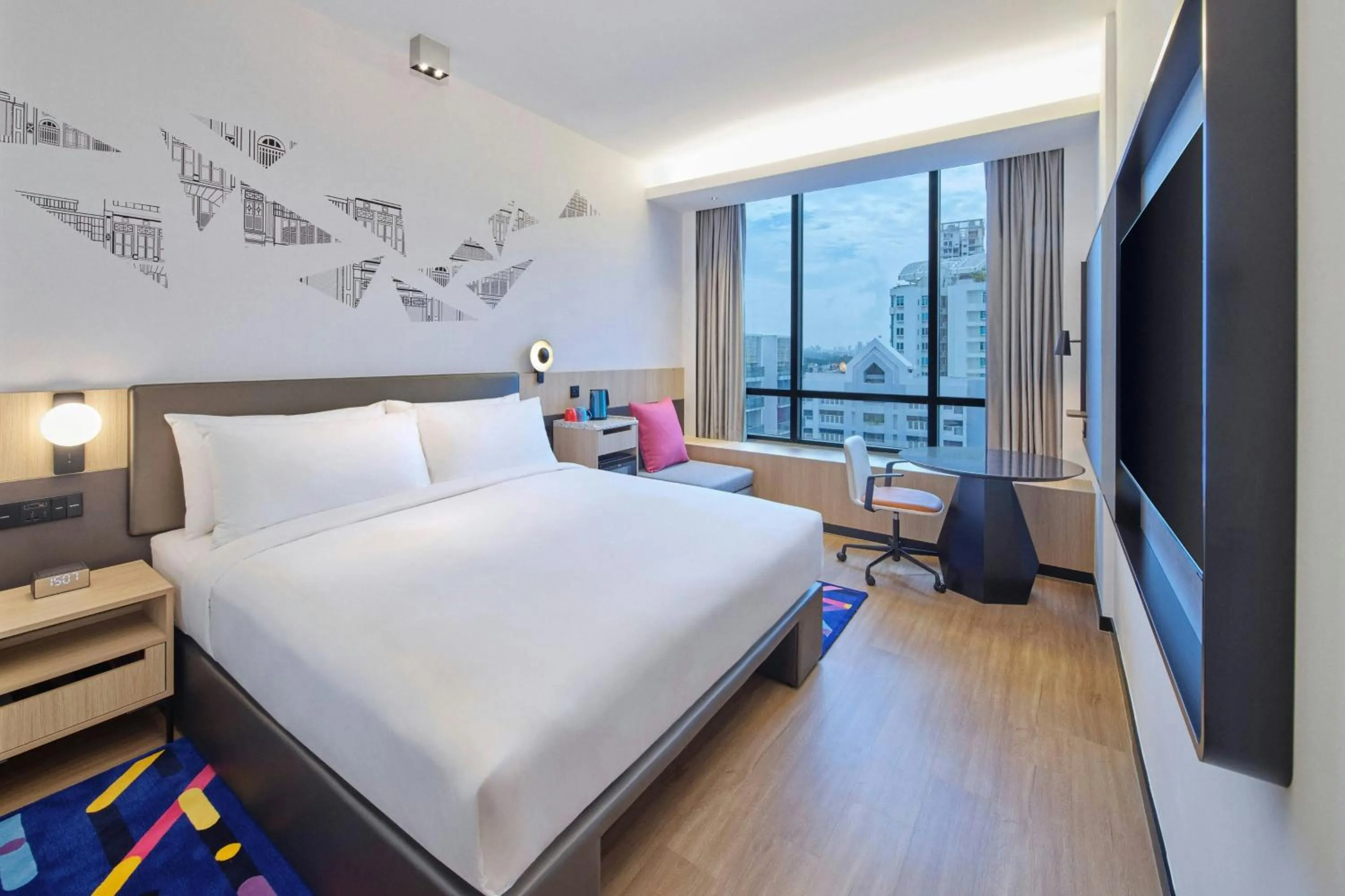 Photo of the whole room, Bed in Aloft Singapore Novena