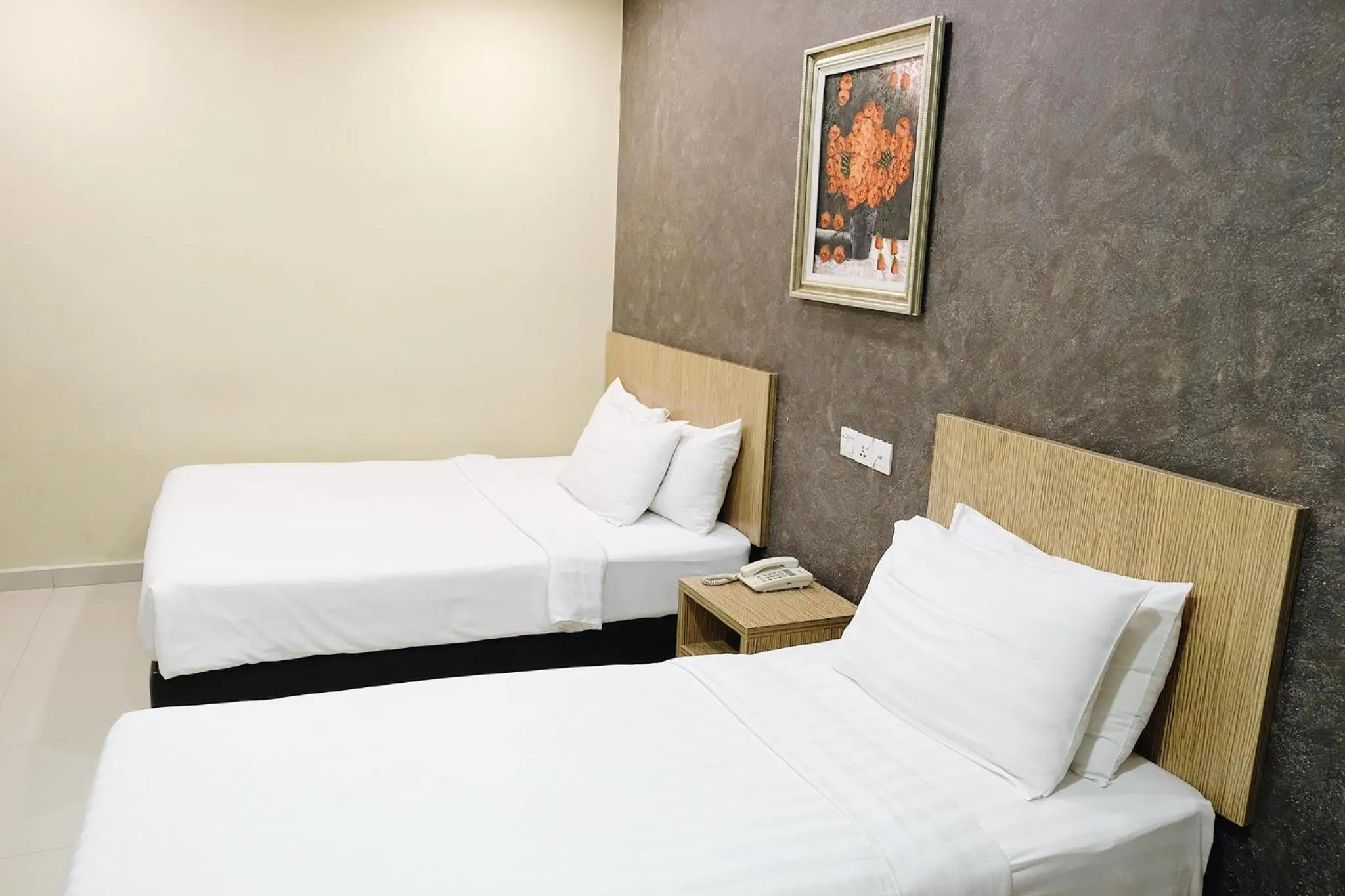 Bed in Era Plus Hotel