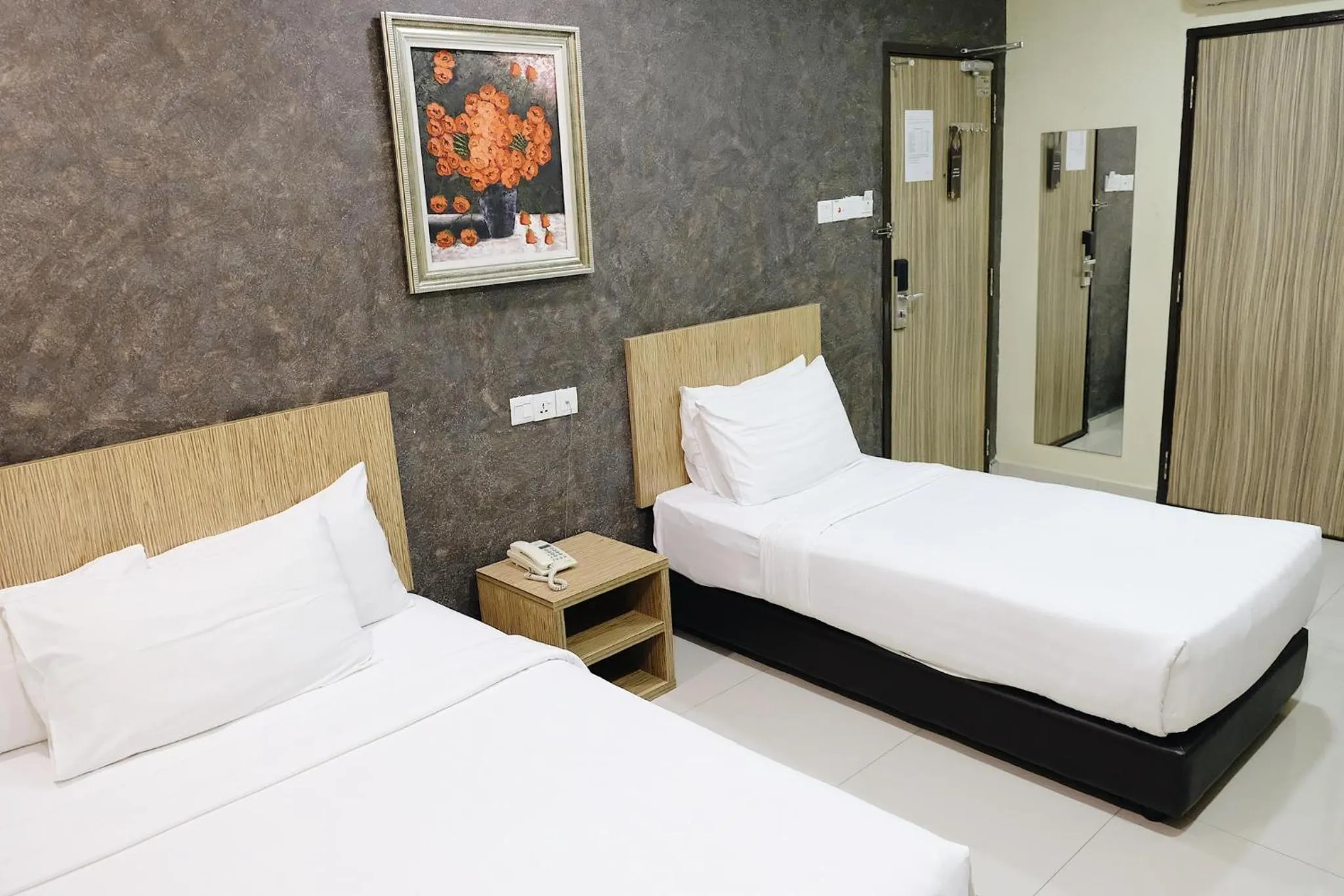 Bed in Era Plus Hotel