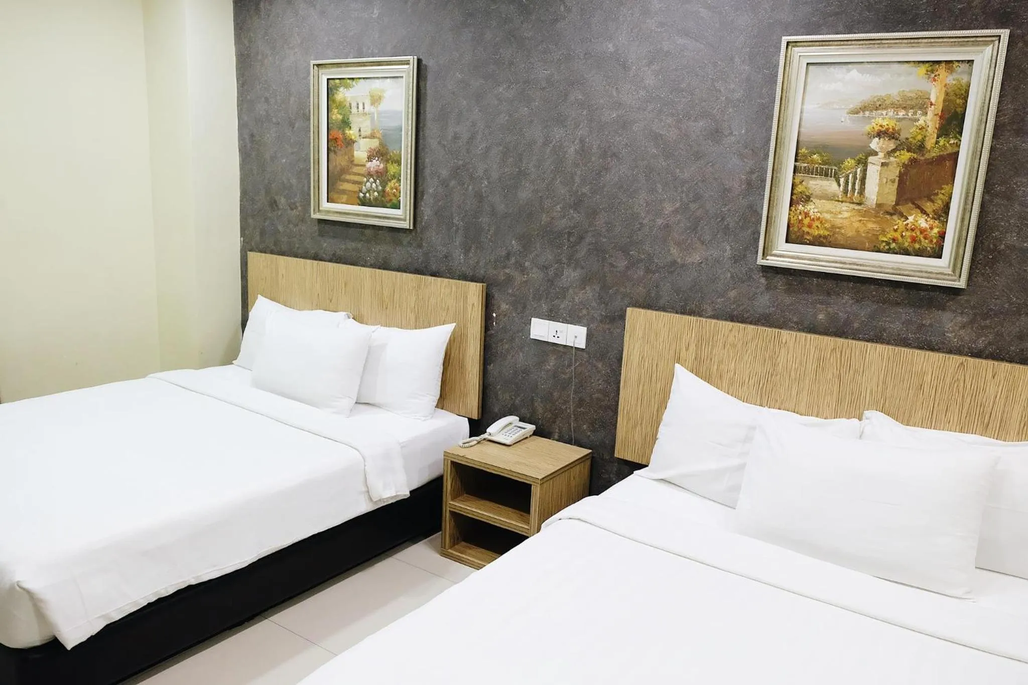 Bed in Era Plus Hotel