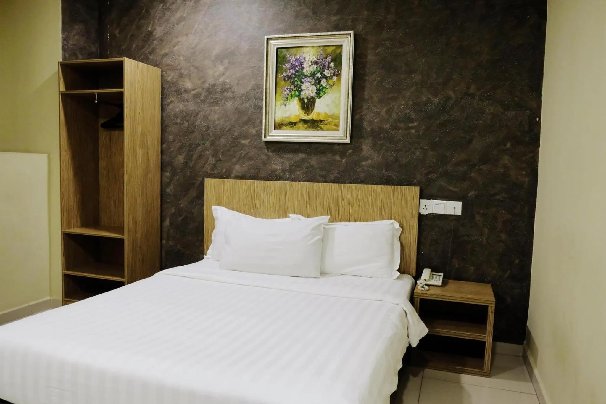 Bed in Era Plus Hotel