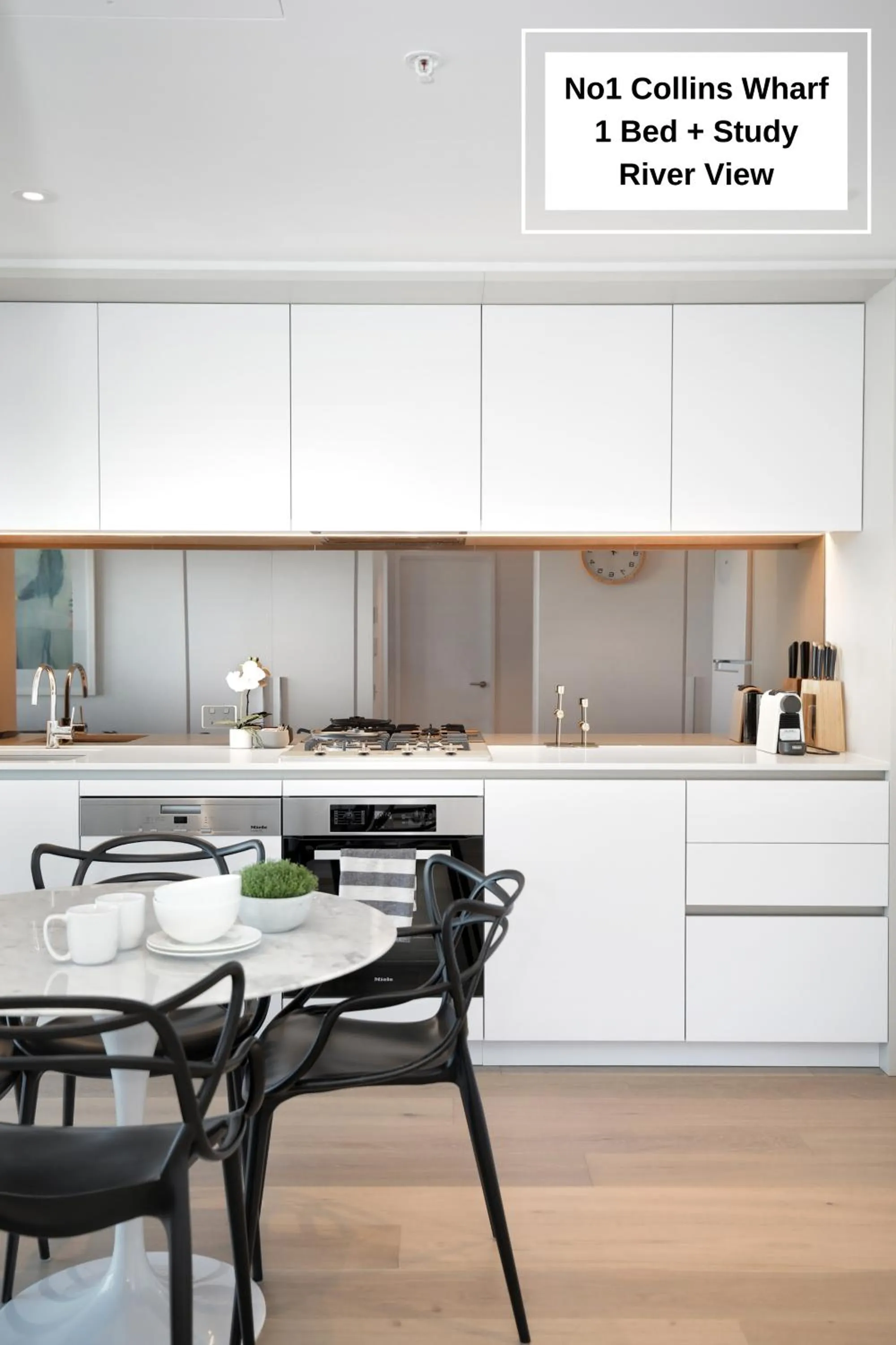Kitchen or kitchenette in Orange Stay at Collins Wharf