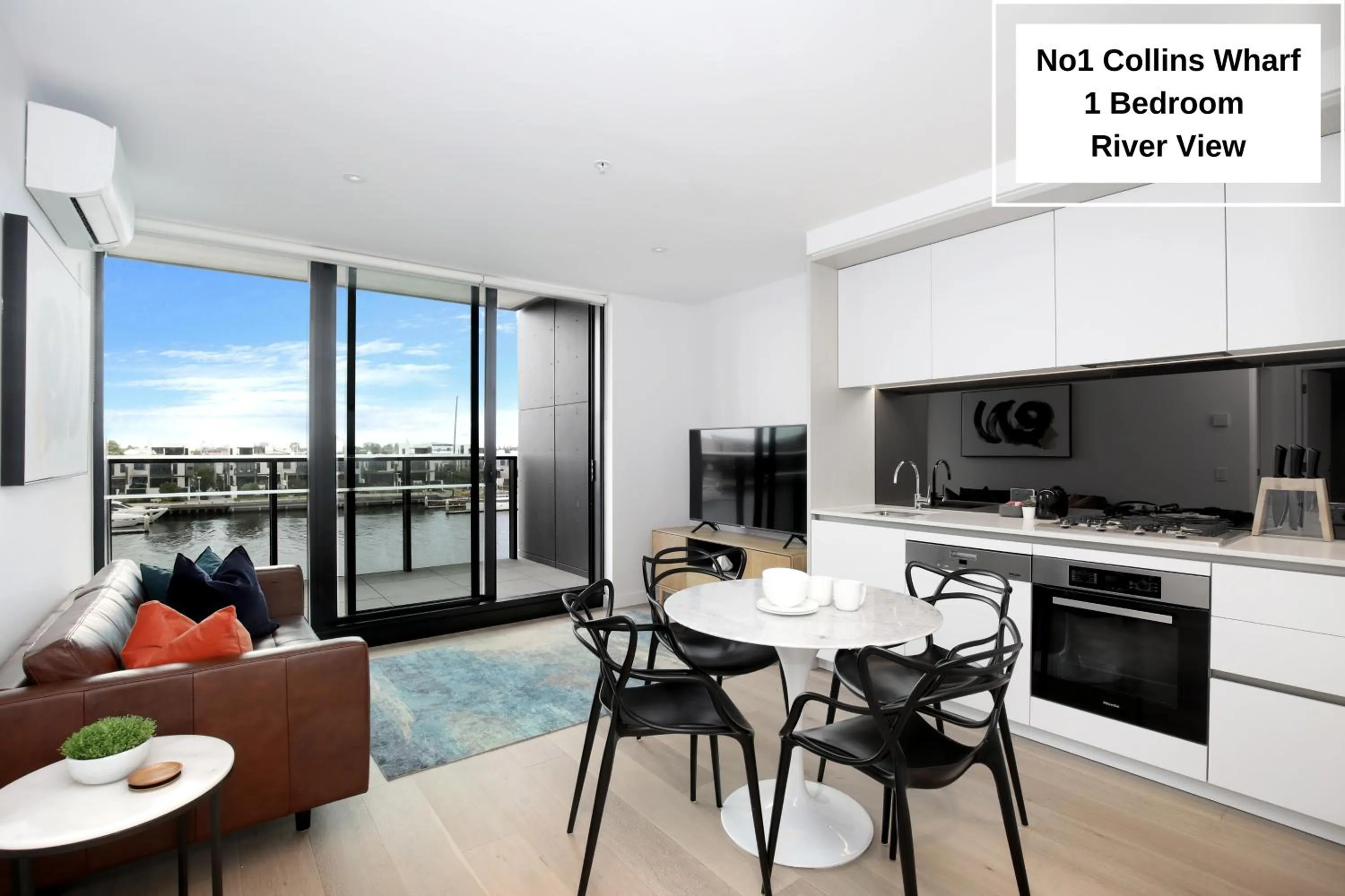 Kitchen or kitchenette in Orange Stay at Collins Wharf