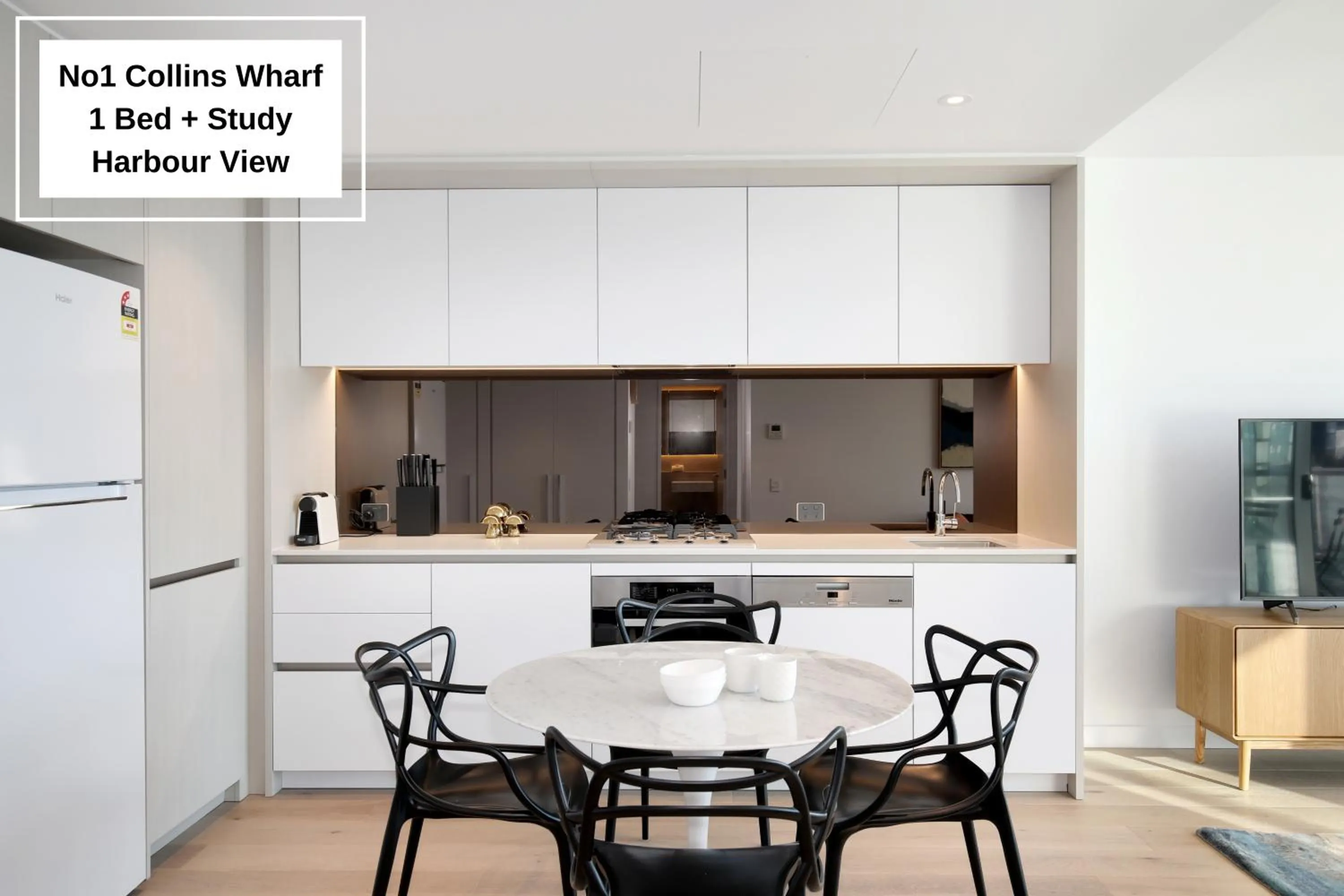 Kitchen or kitchenette in Orange Stay at Collins Wharf