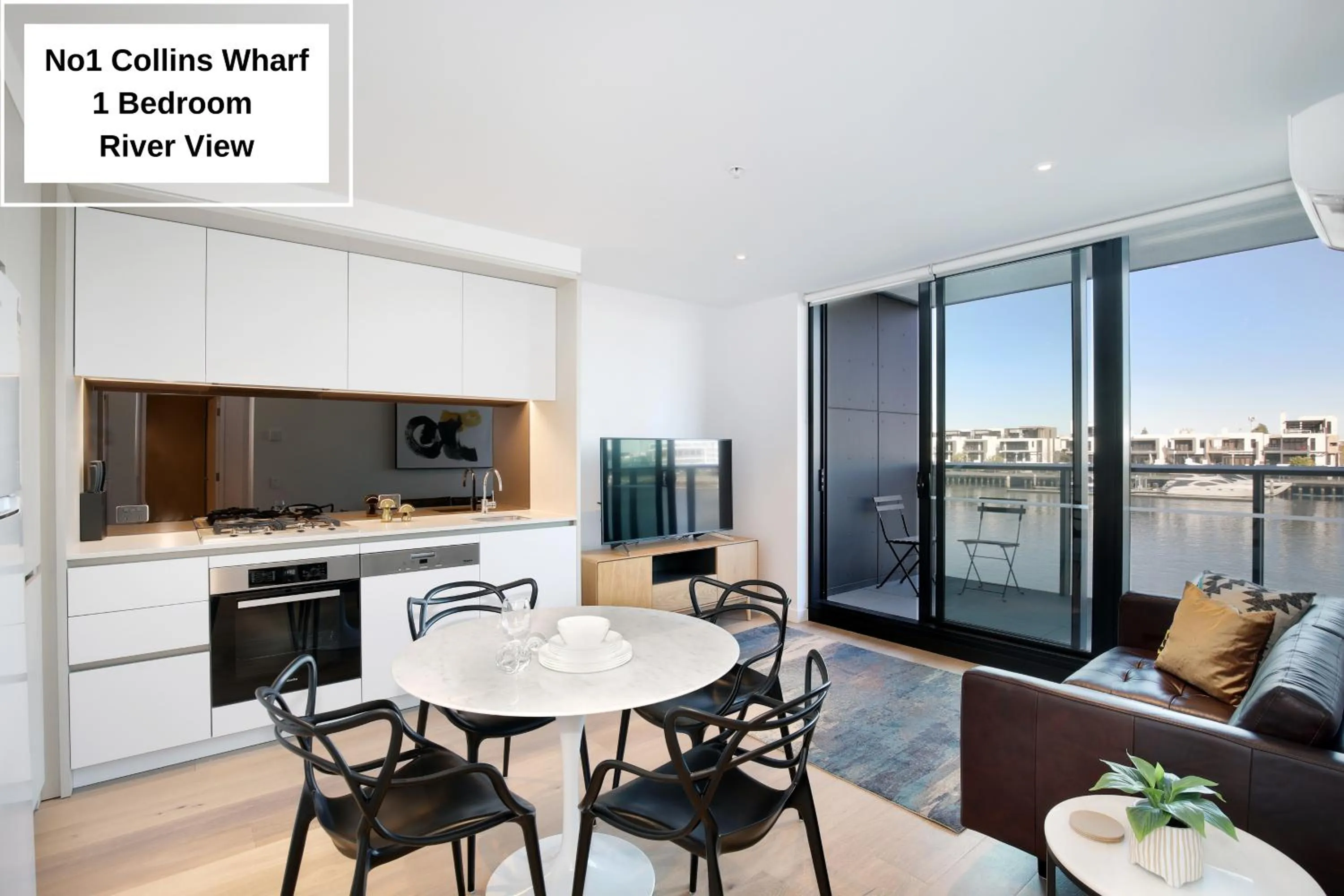 Kitchen or kitchenette in Orange Stay at Collins Wharf