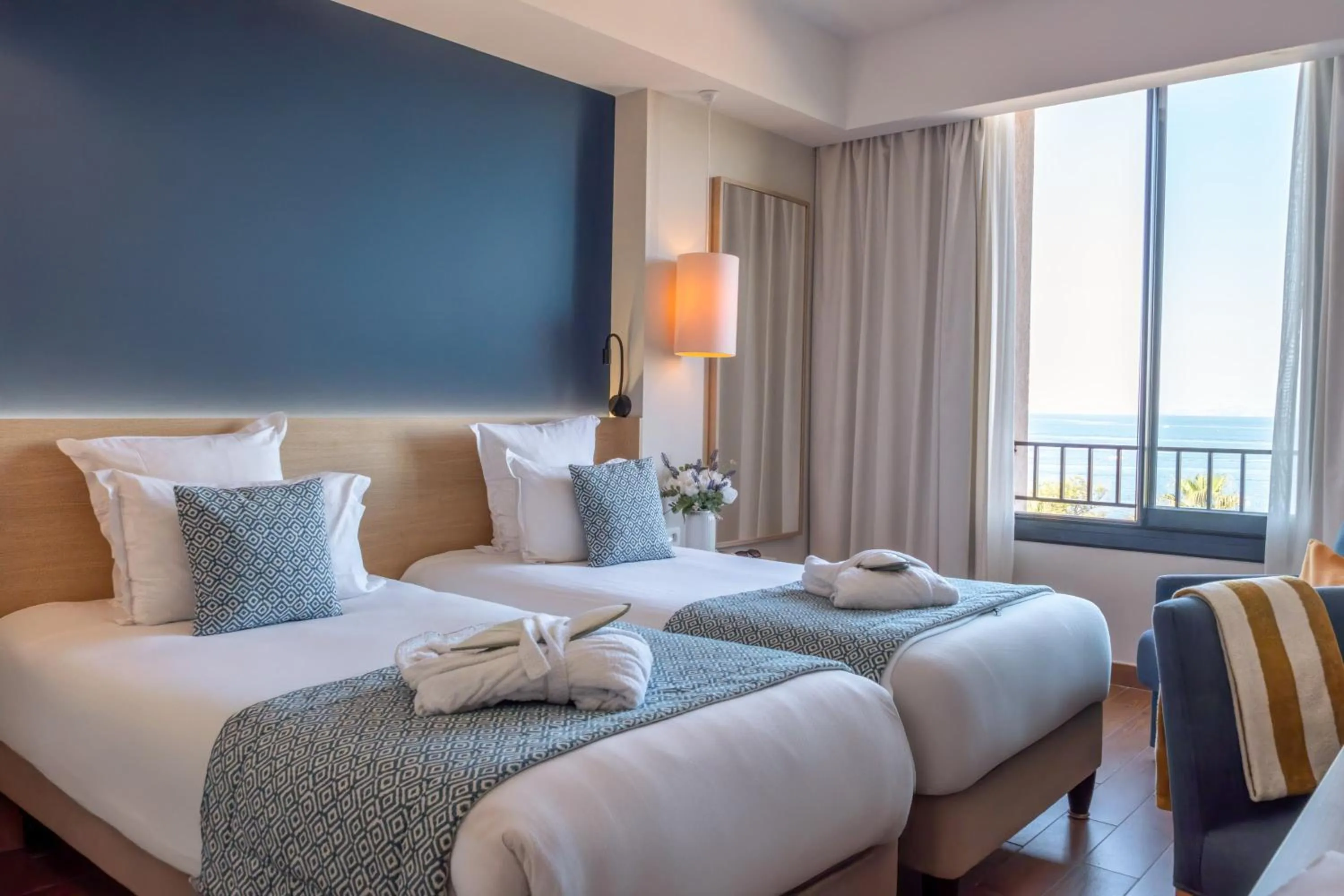 Photo of the whole room, Bed in Hôtel Helios & SPA - Ile des Embiez