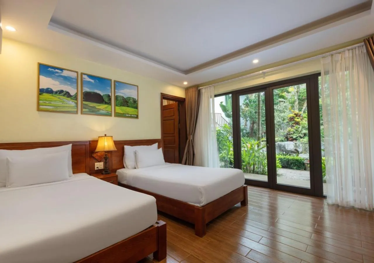 Bed in Bai Dinh Garden Resort & Spa