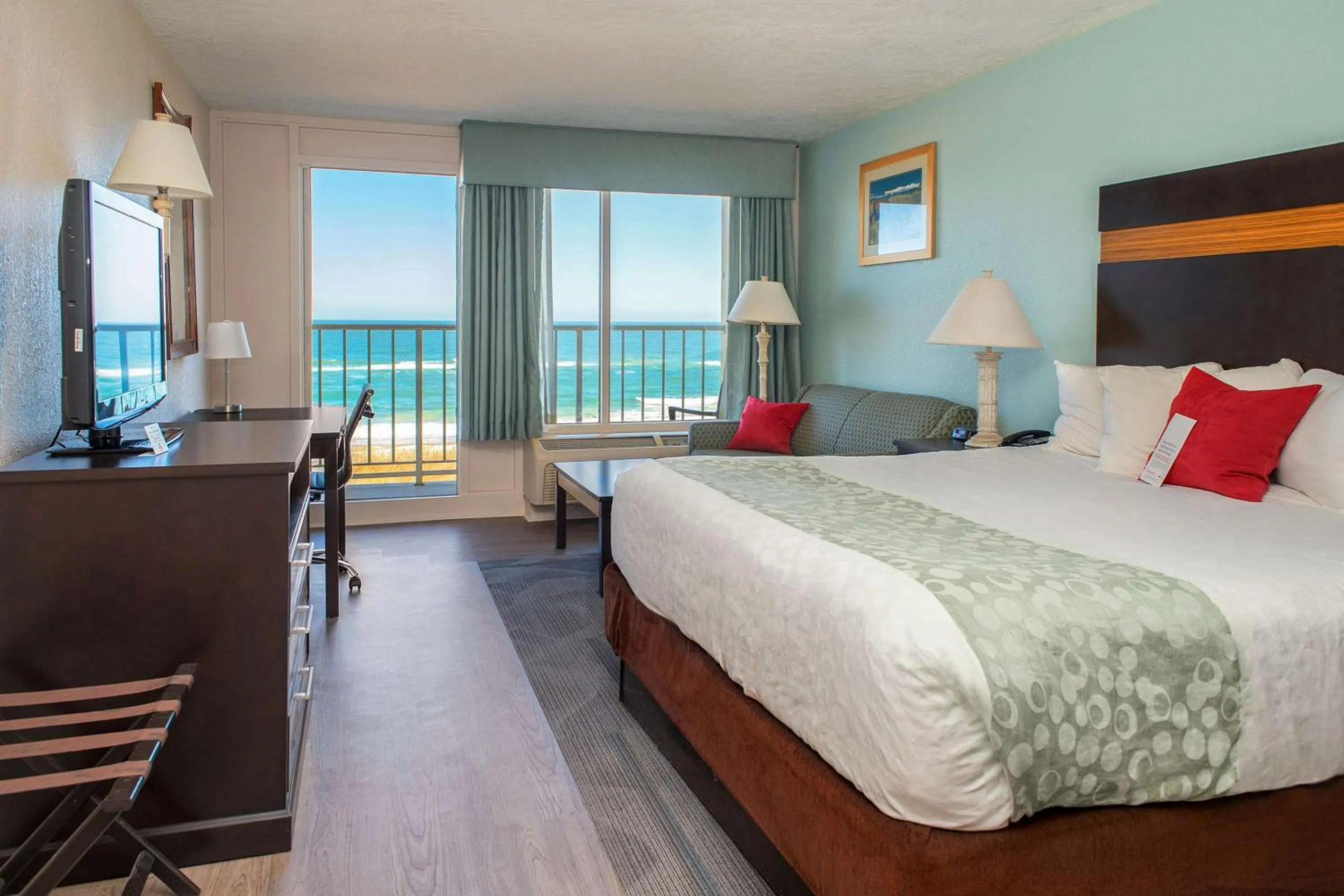 Photo of the whole room, Bed in Ramada Plaza by Wyndham Nags Head Oceanfront