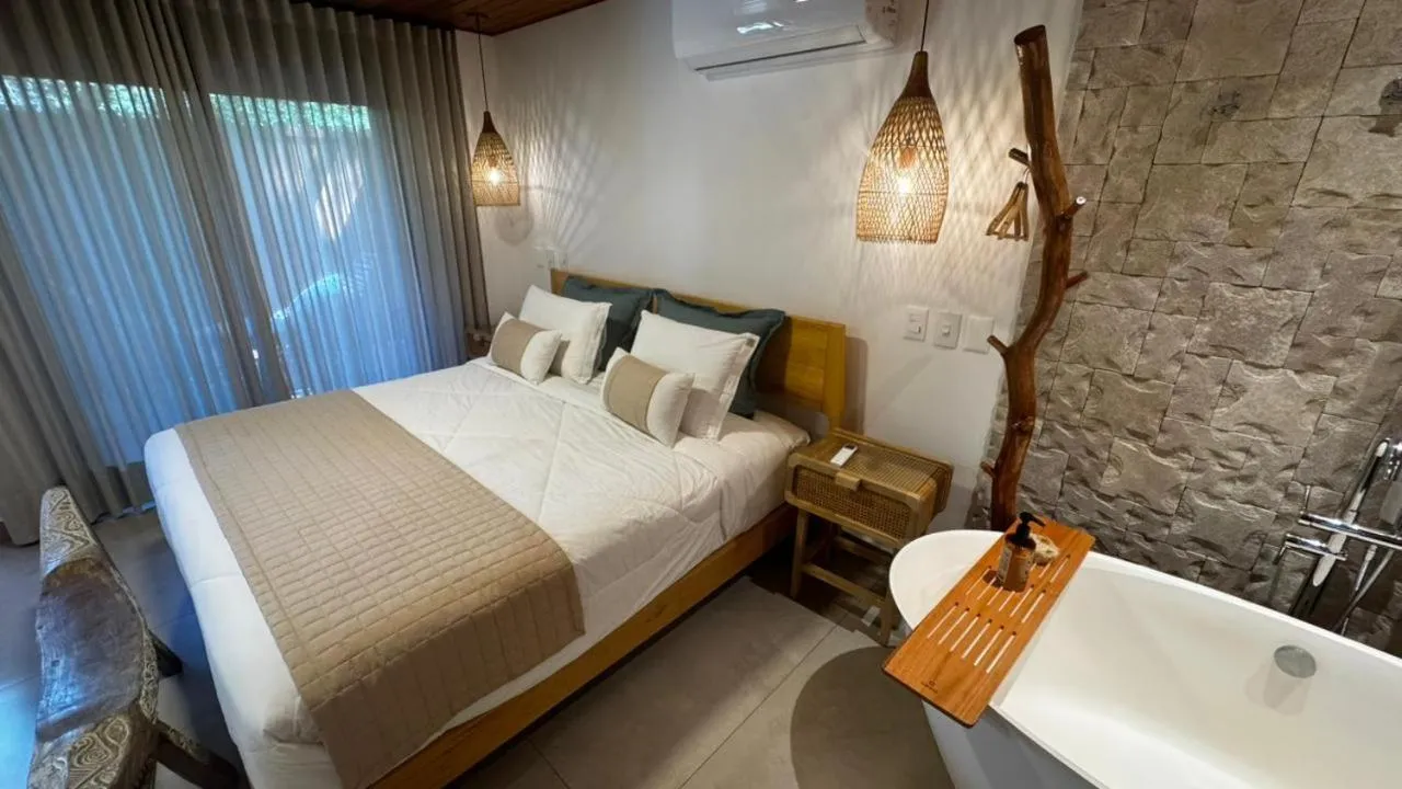 Bed in Pousada Astral da Ilha