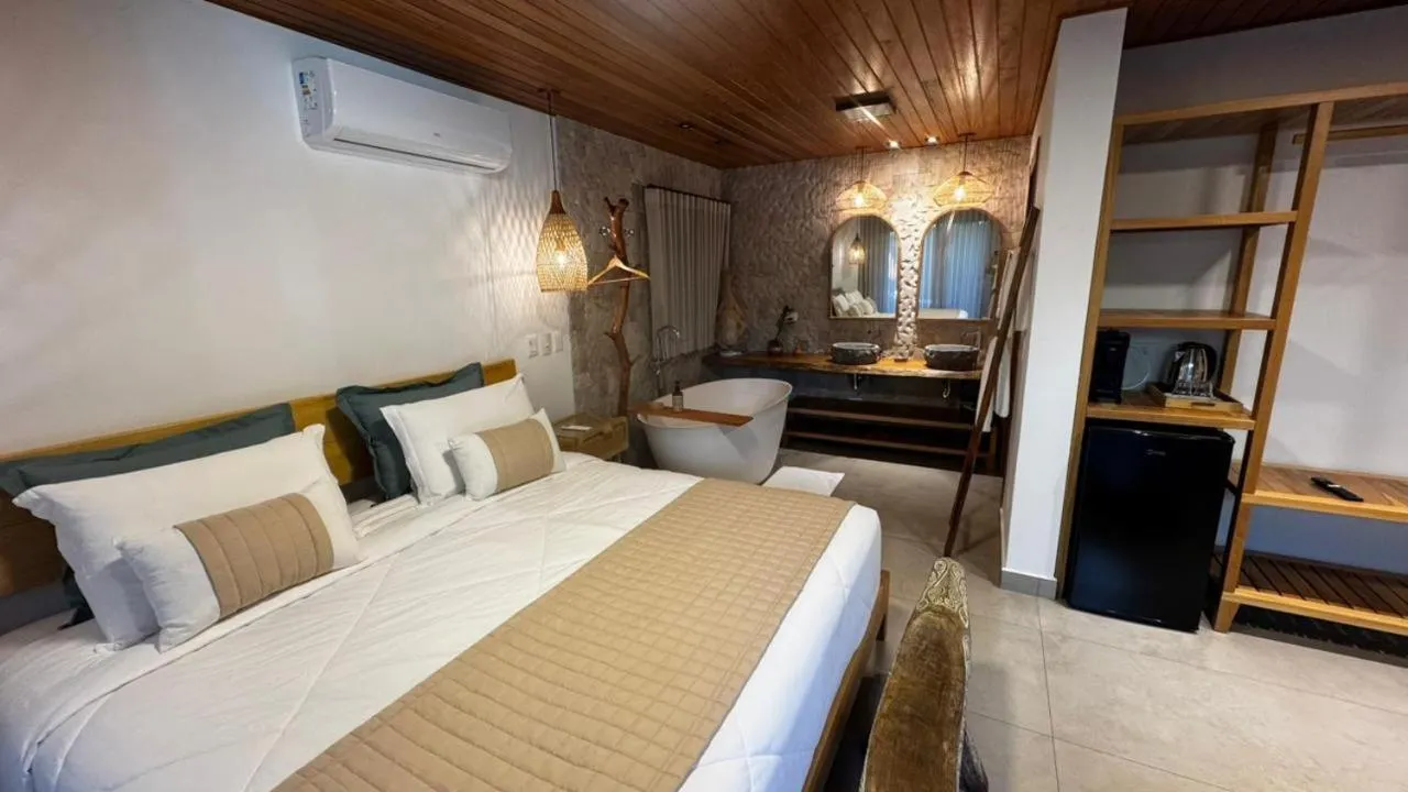 Bed in Pousada Astral da Ilha