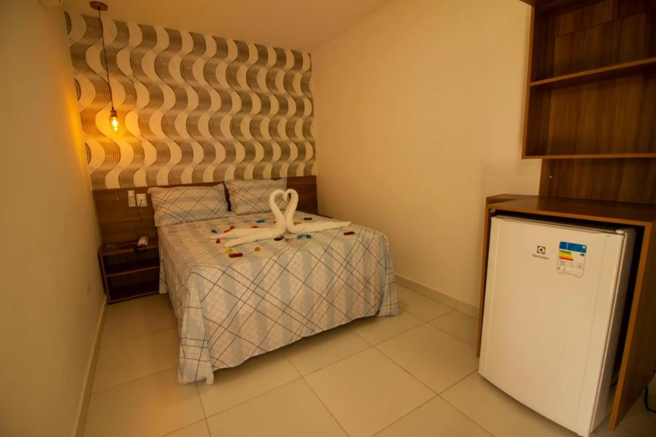 Bed in Pousada Aliança