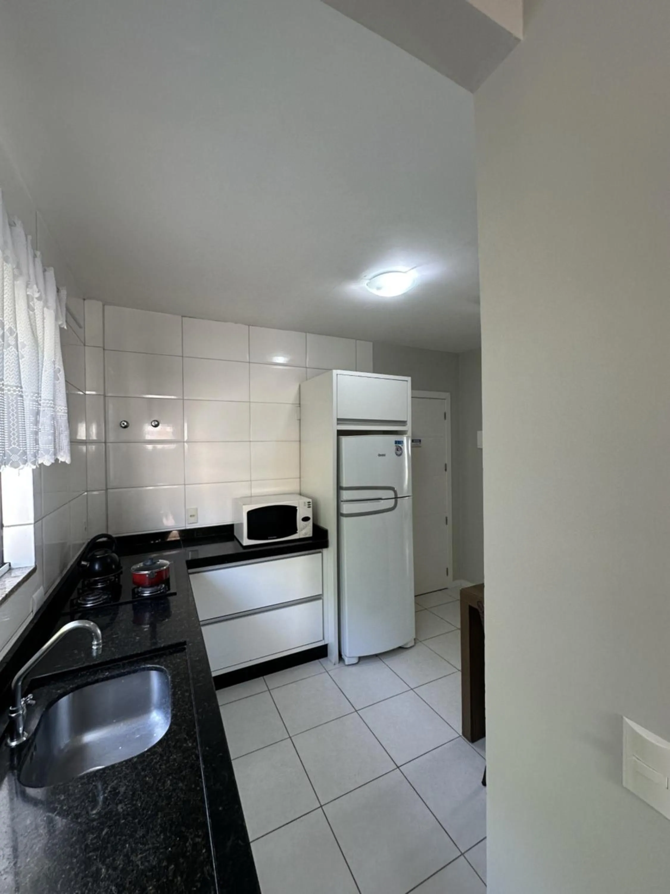 Kitchen or kitchenette in Pousada Brisa do Mar