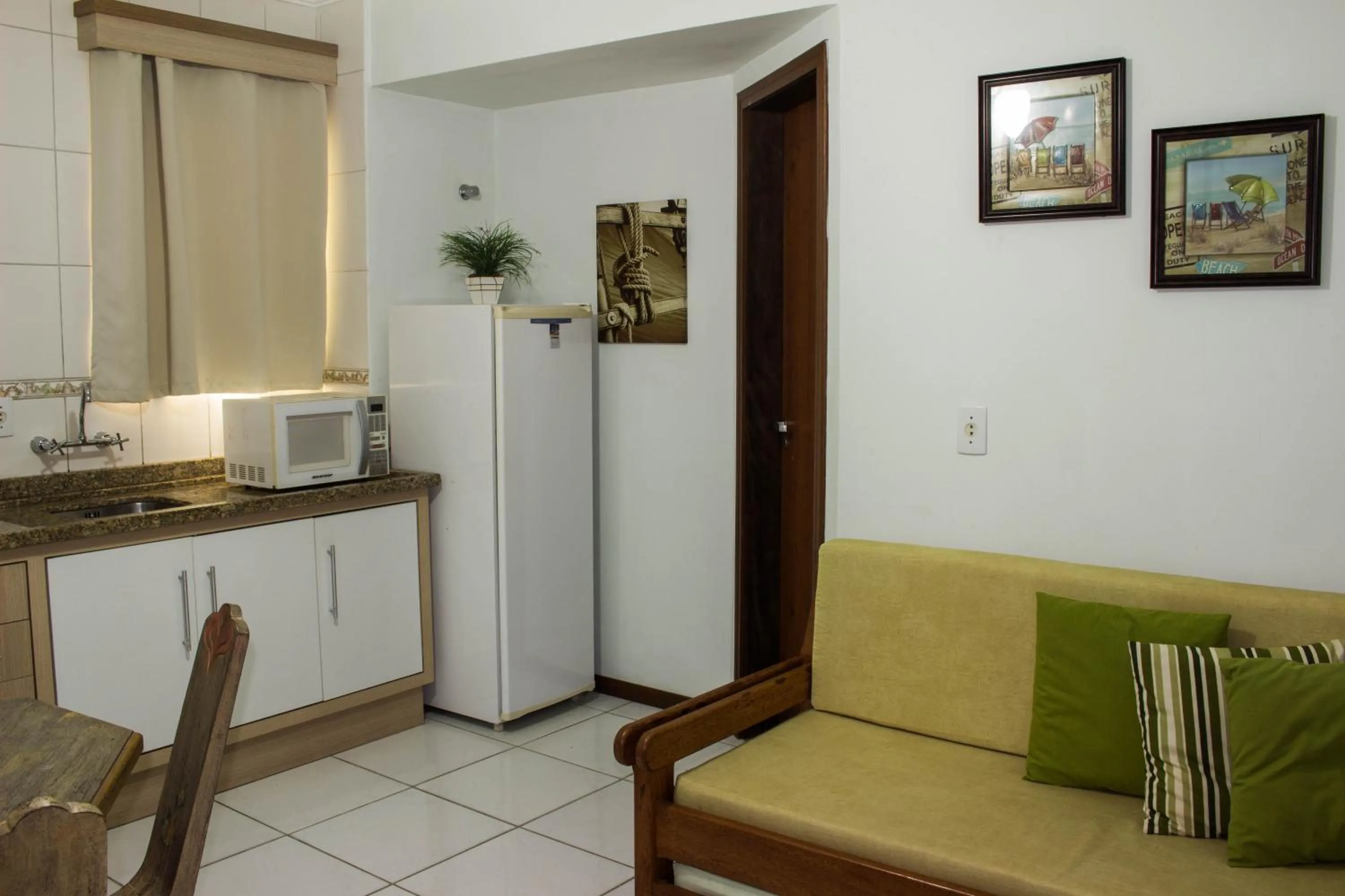 Kitchen or kitchenette in Pousada Brisa do Mar