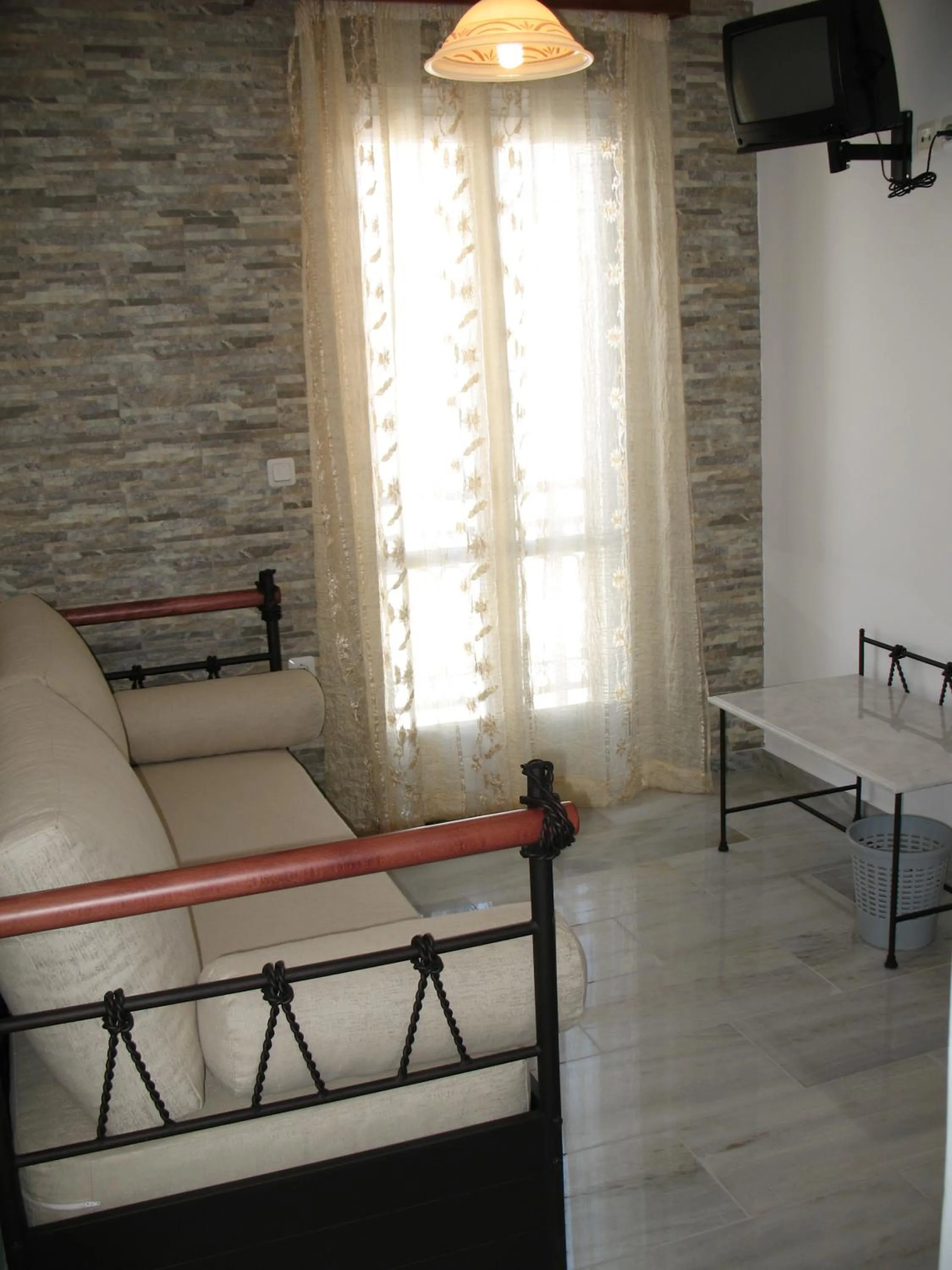 Photo of the whole room, Bed in Iliovasilema