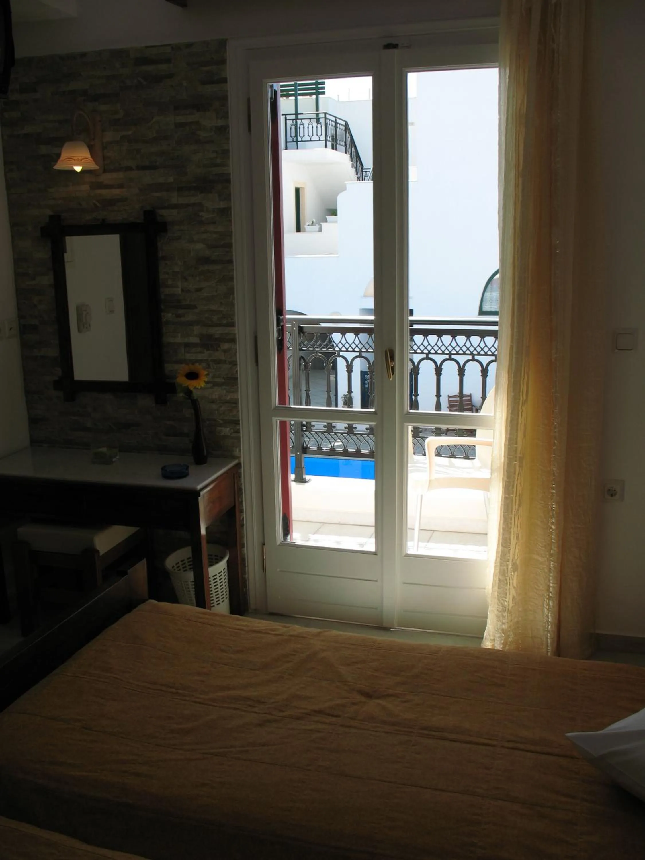 Pool view, Bed in Iliovasilema