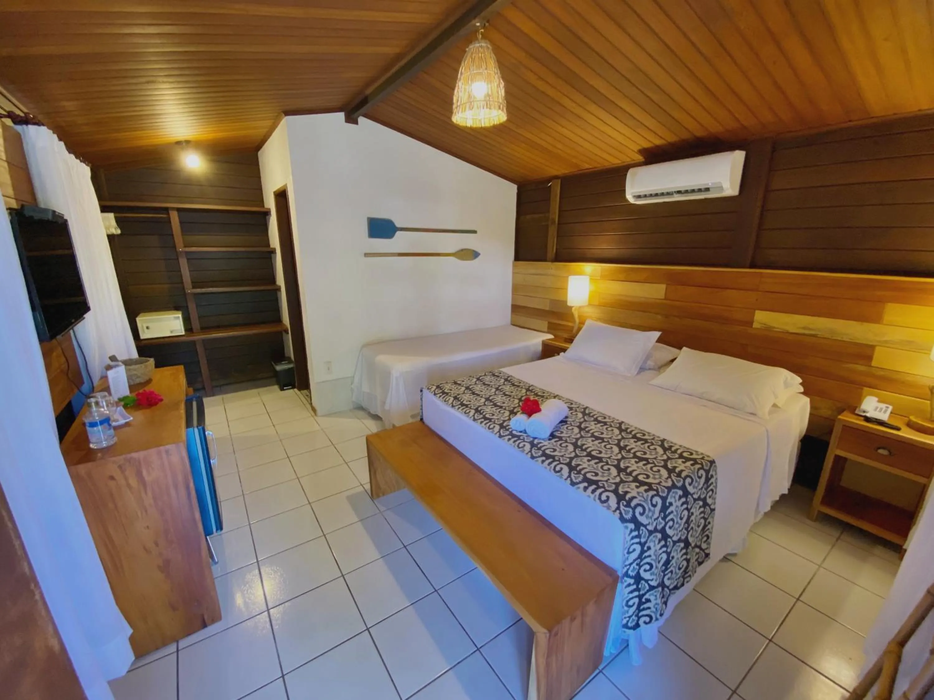 Photo of the whole room, Bed in Pousada Estrela do Mar Noronha by Alto da Ilha
