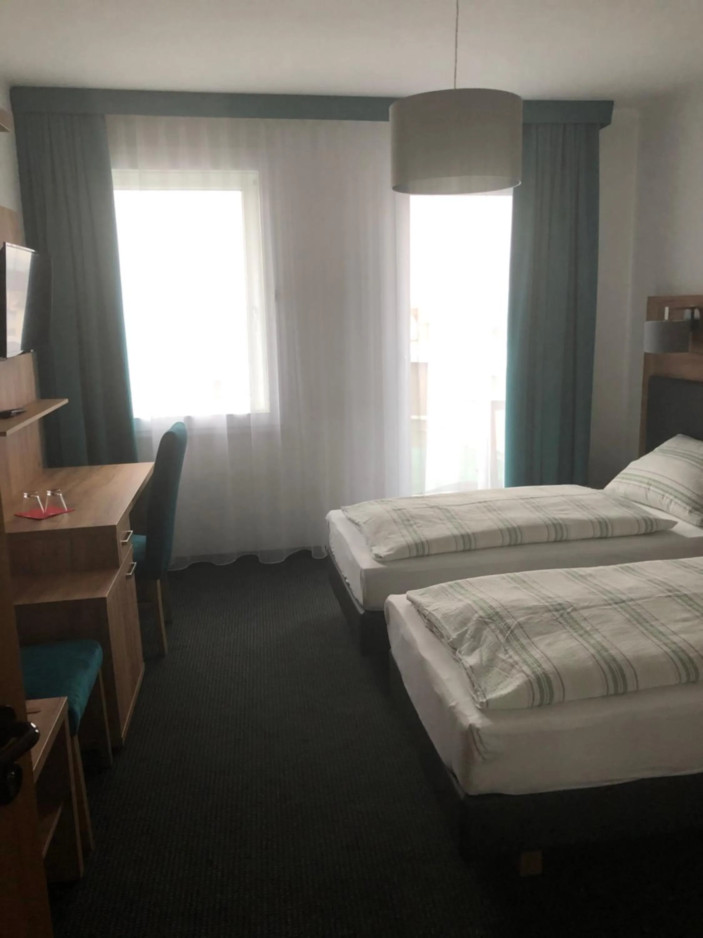 Photo of the whole room, Bed in Burghotel Homberg