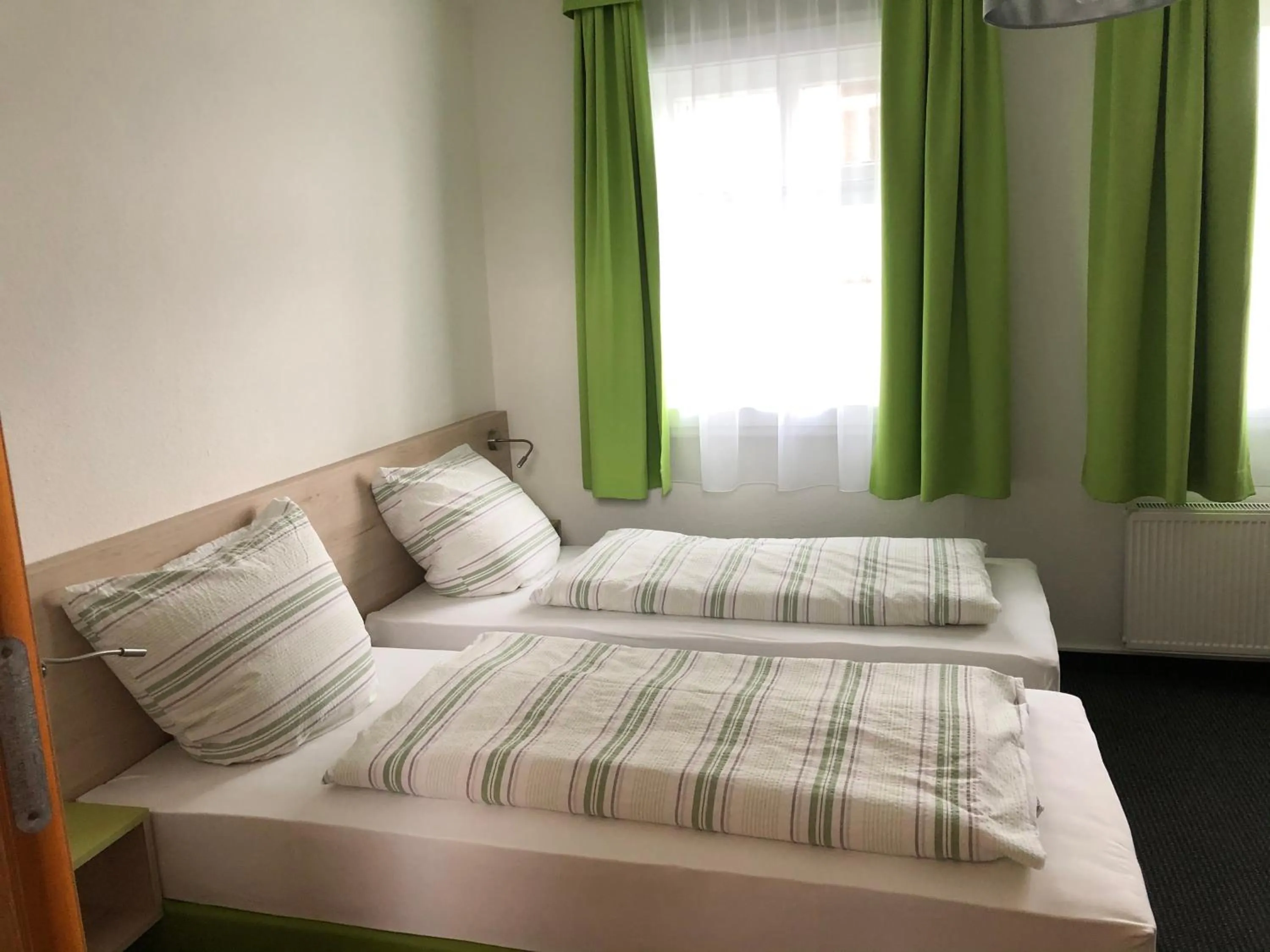 Photo of the whole room, Bed in Burghotel Homberg