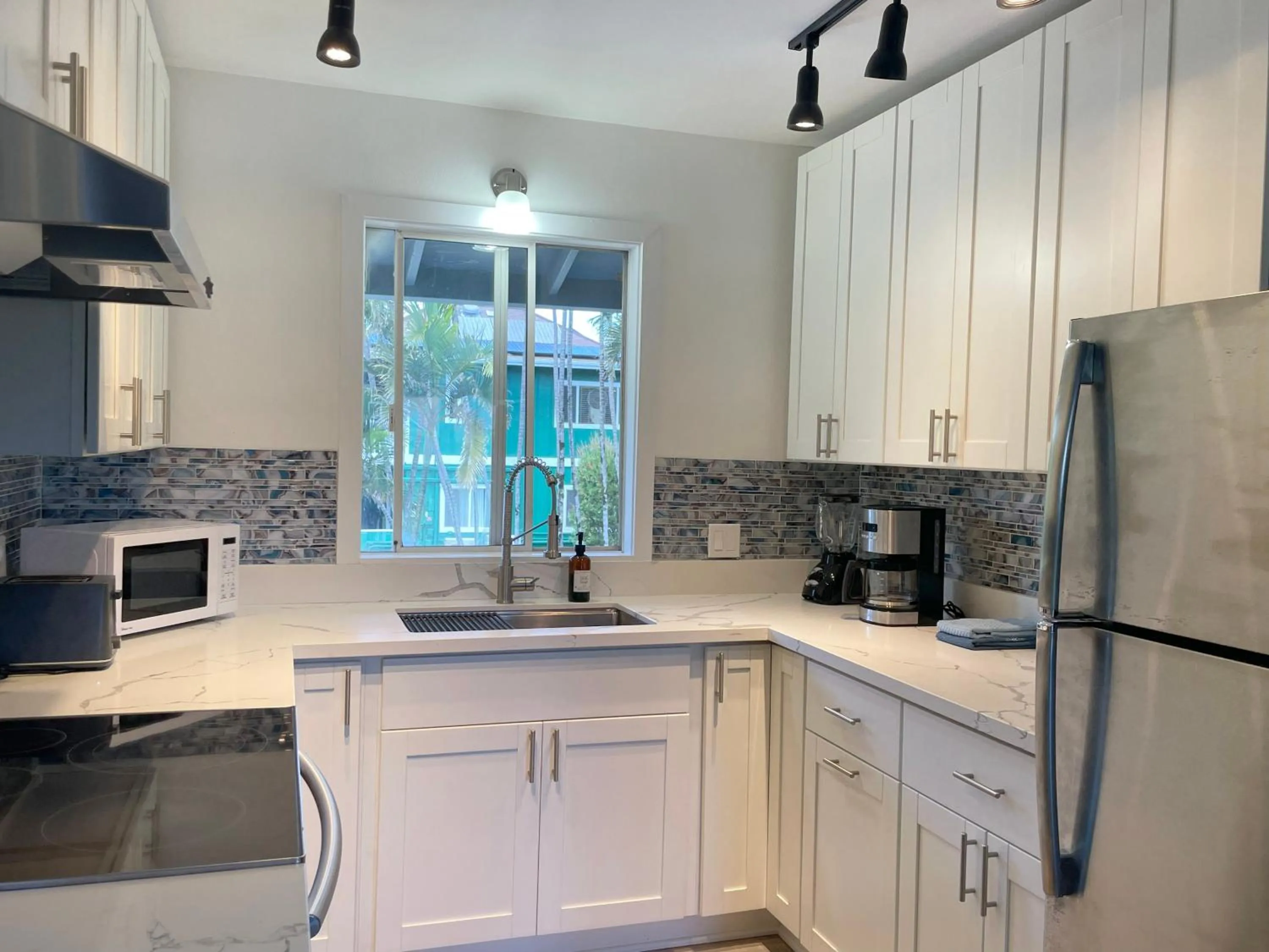 Kitchen or kitchenette in Puu Koa Palms vacation rental