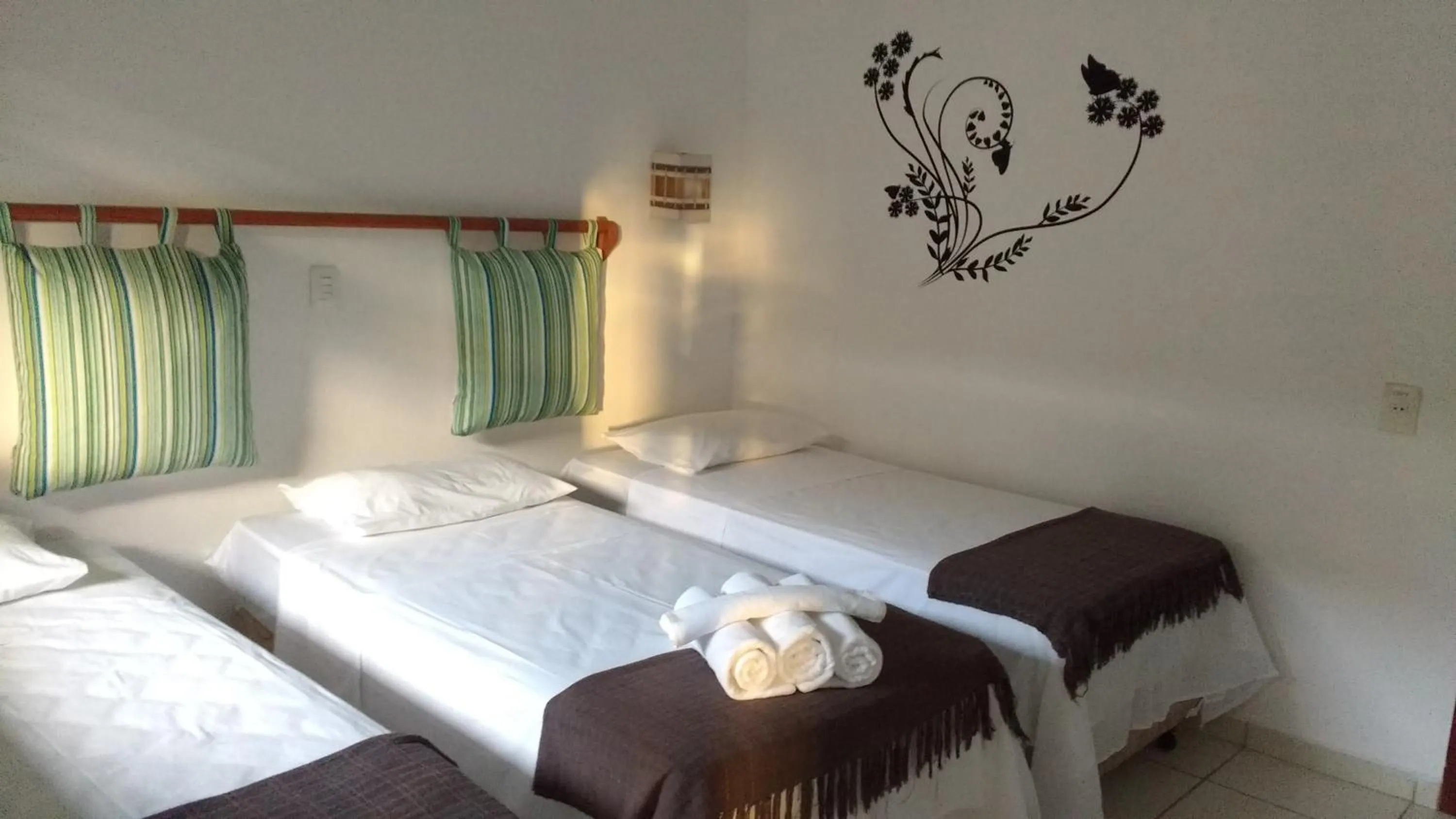 Photo of the whole room, Bed in Pousada Manhã Dourada