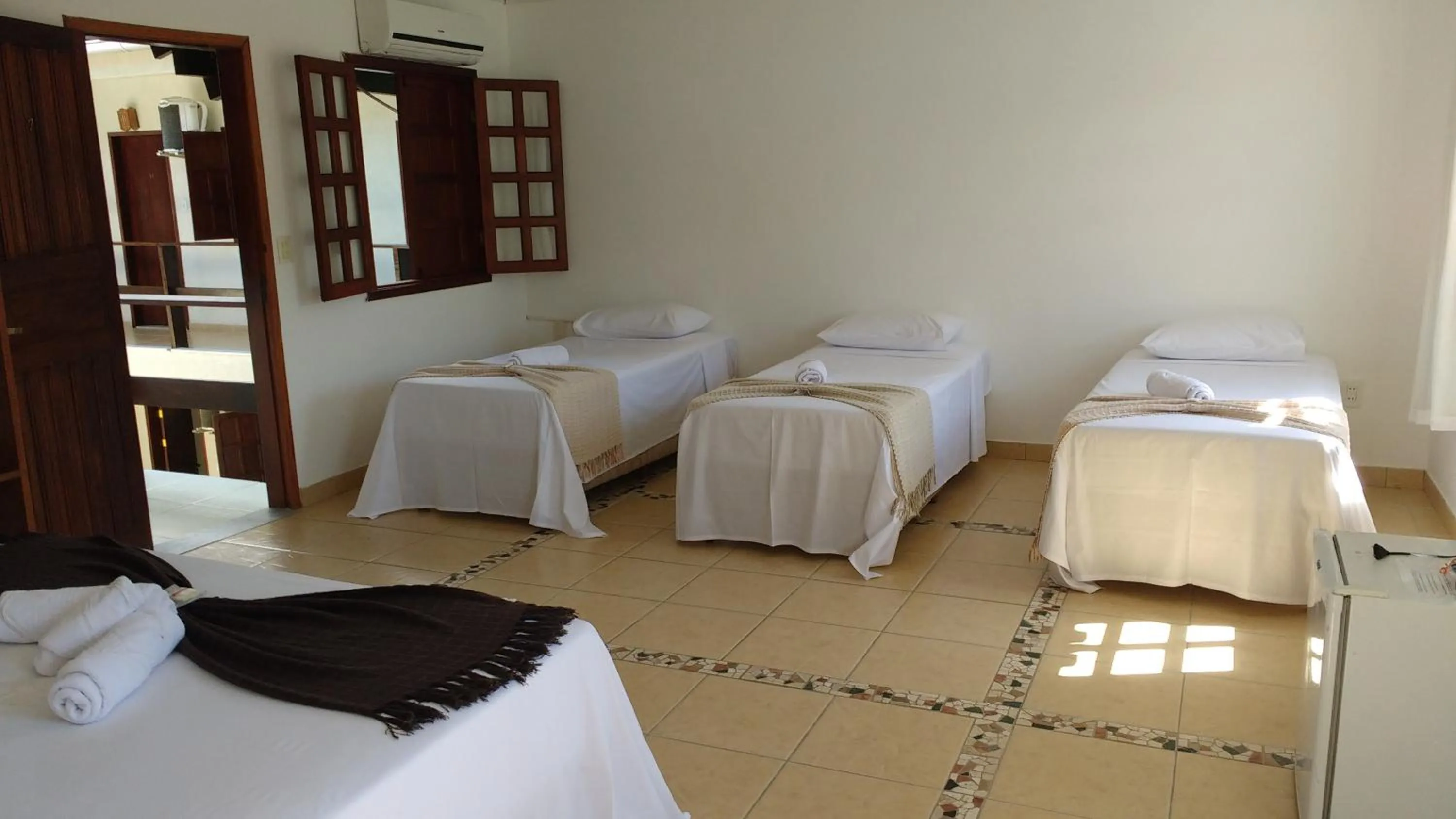 Bed in Pousada Manhã Dourada