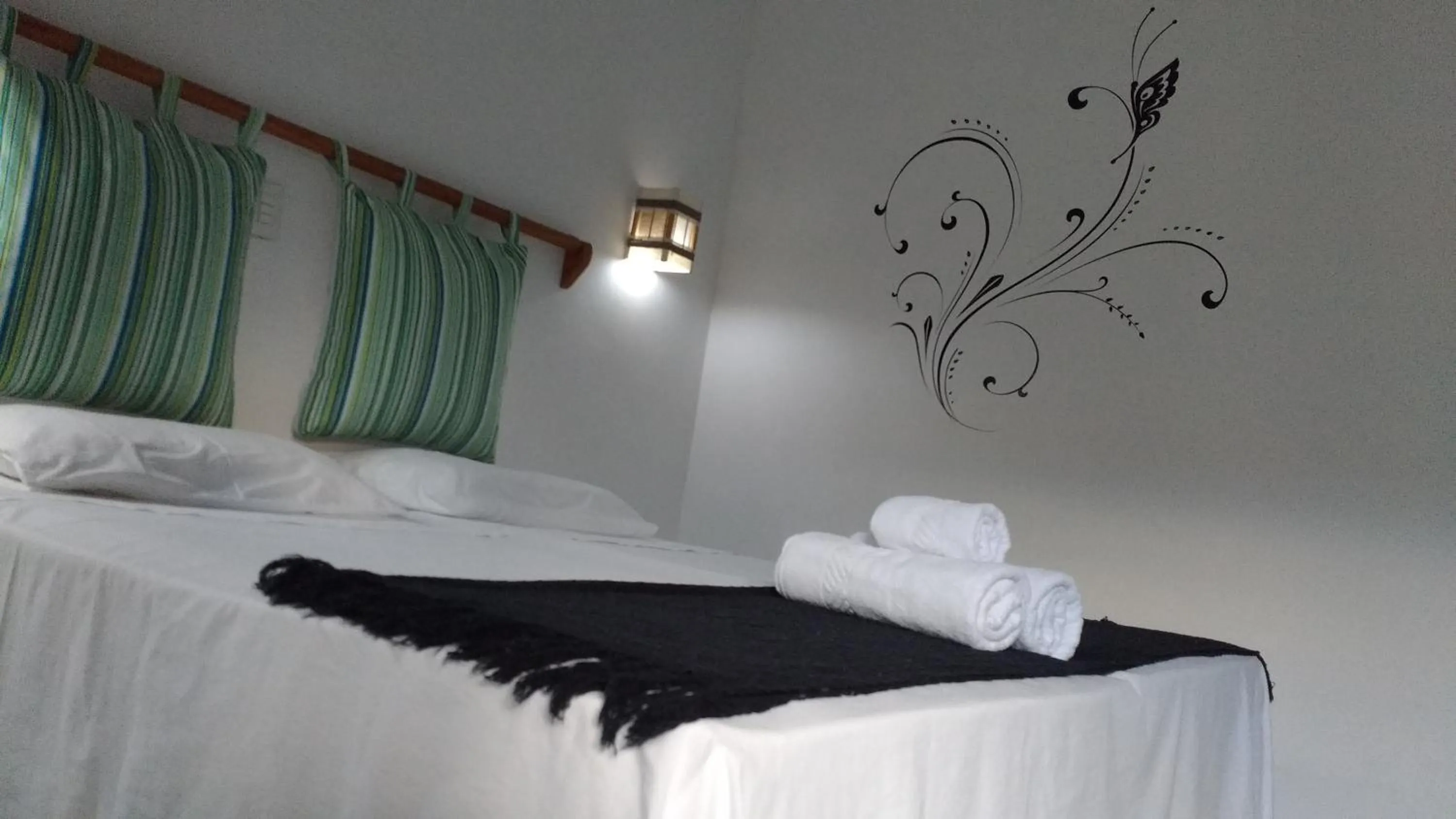 Decorative detail, Bed in Pousada Manhã Dourada