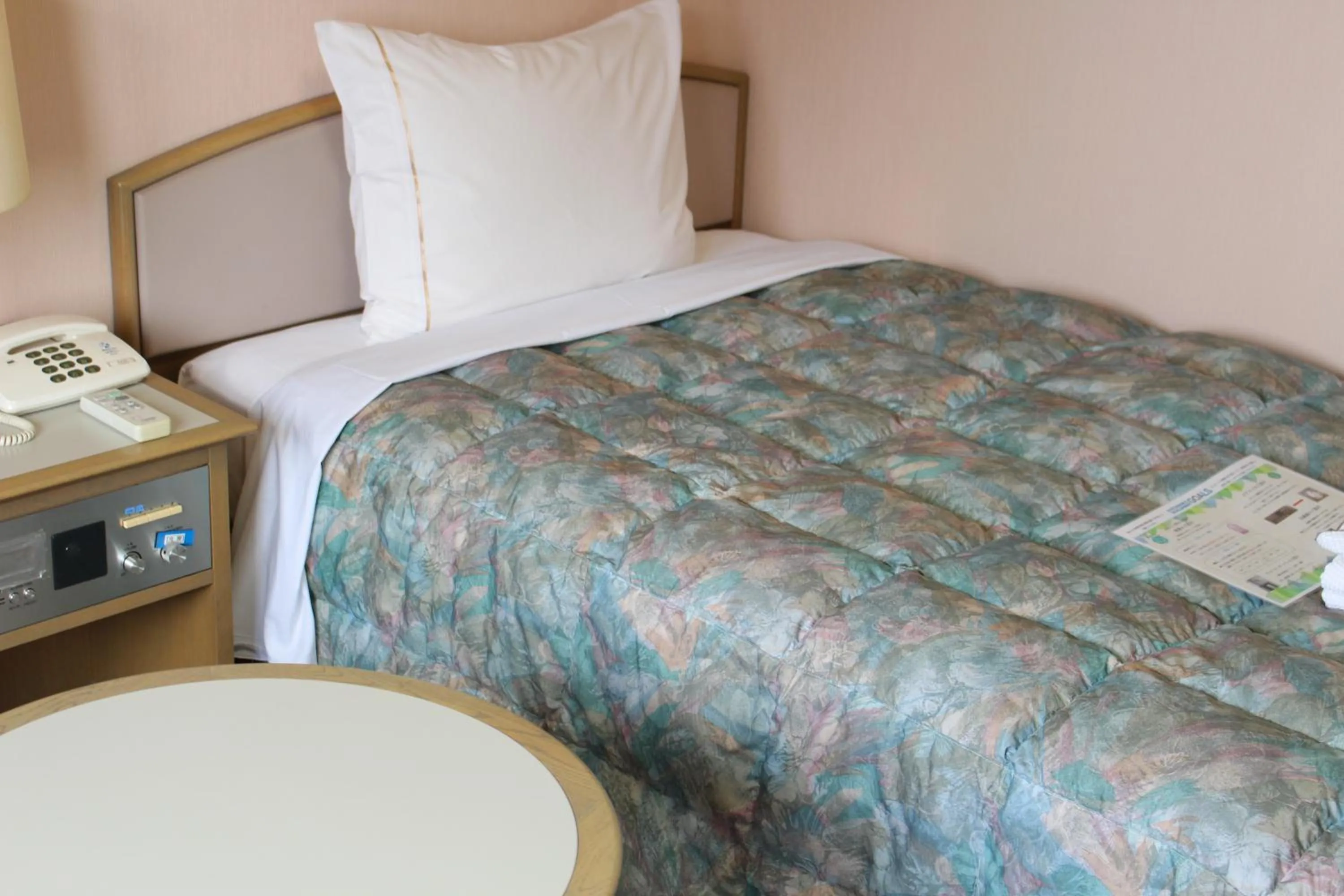 Bed in Hotel Rubura Ohzan