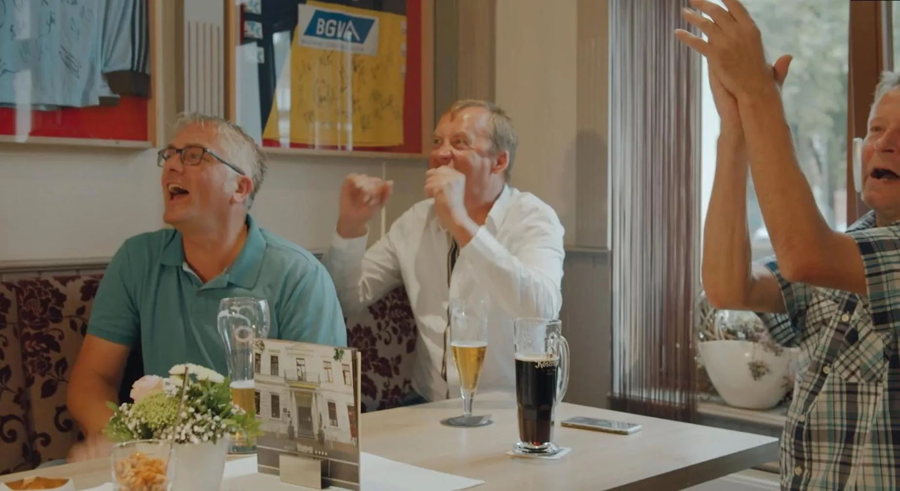Communal lounge/ TV room in Hotel Am Schloss Aurich
