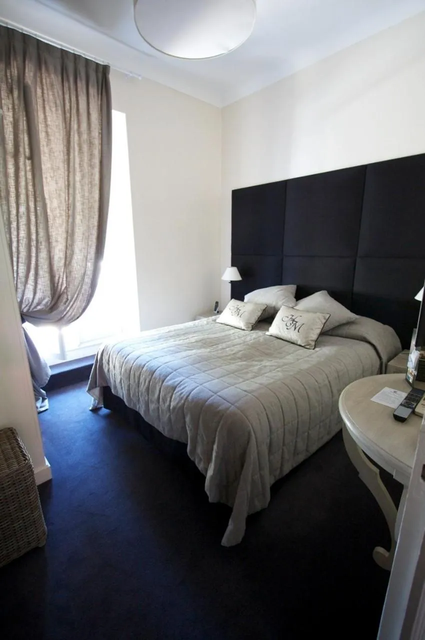 Bedroom in Hotel De Monaco
