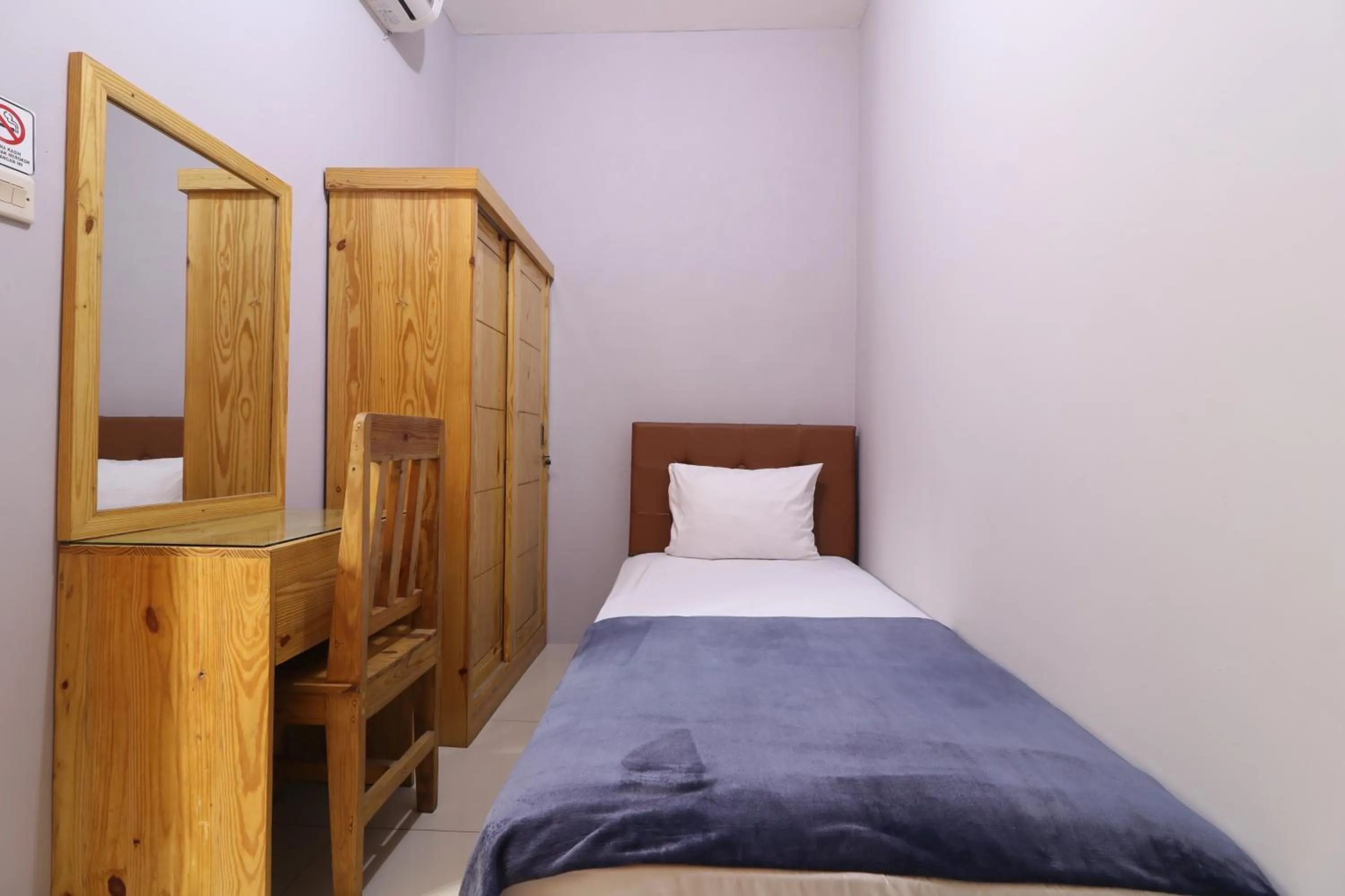 Bed in Bedur Homestay Syariah